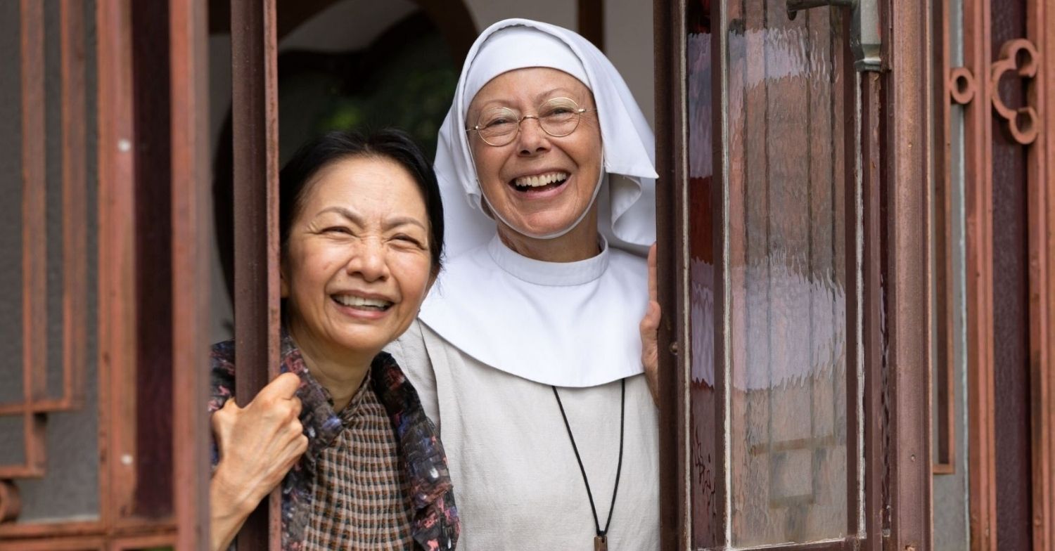 Sister Julienne smiles for the Call the Midwife Christmas special 2025