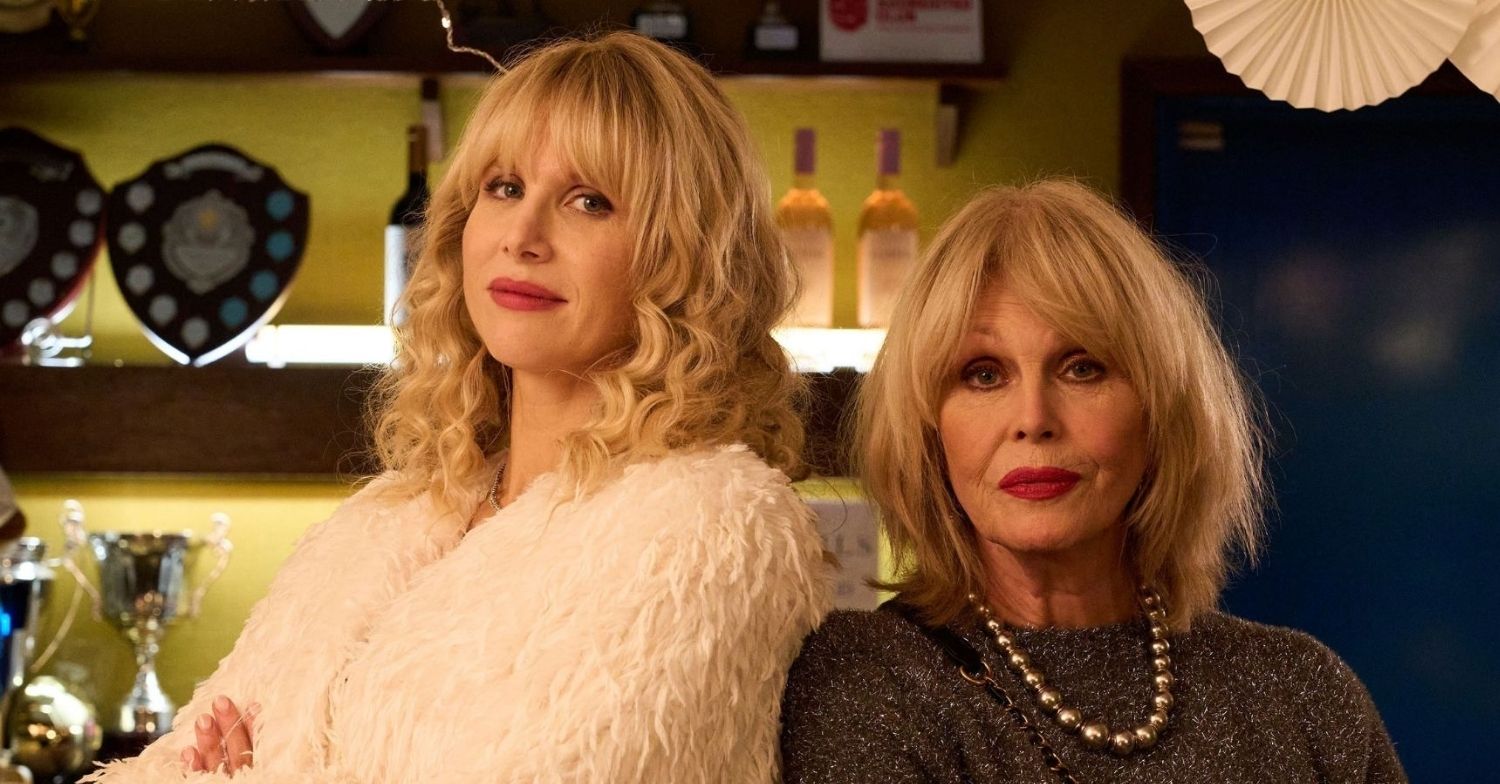 Amandaland's Amanda and Felicity in smart clothes facing the camera