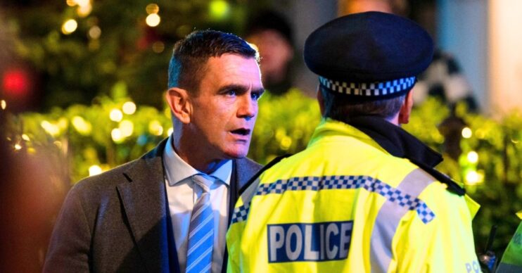 Jack looks angry as he talks to a police officer in EastEnders tonight (Credit: BBC/Composite: ED!)
