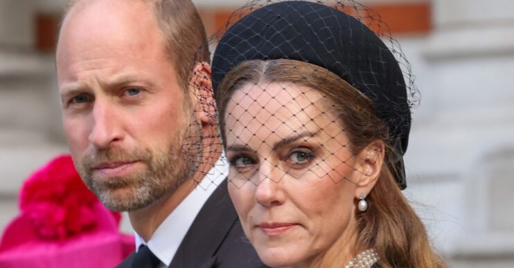 Prince William frowning beside Princess Kate