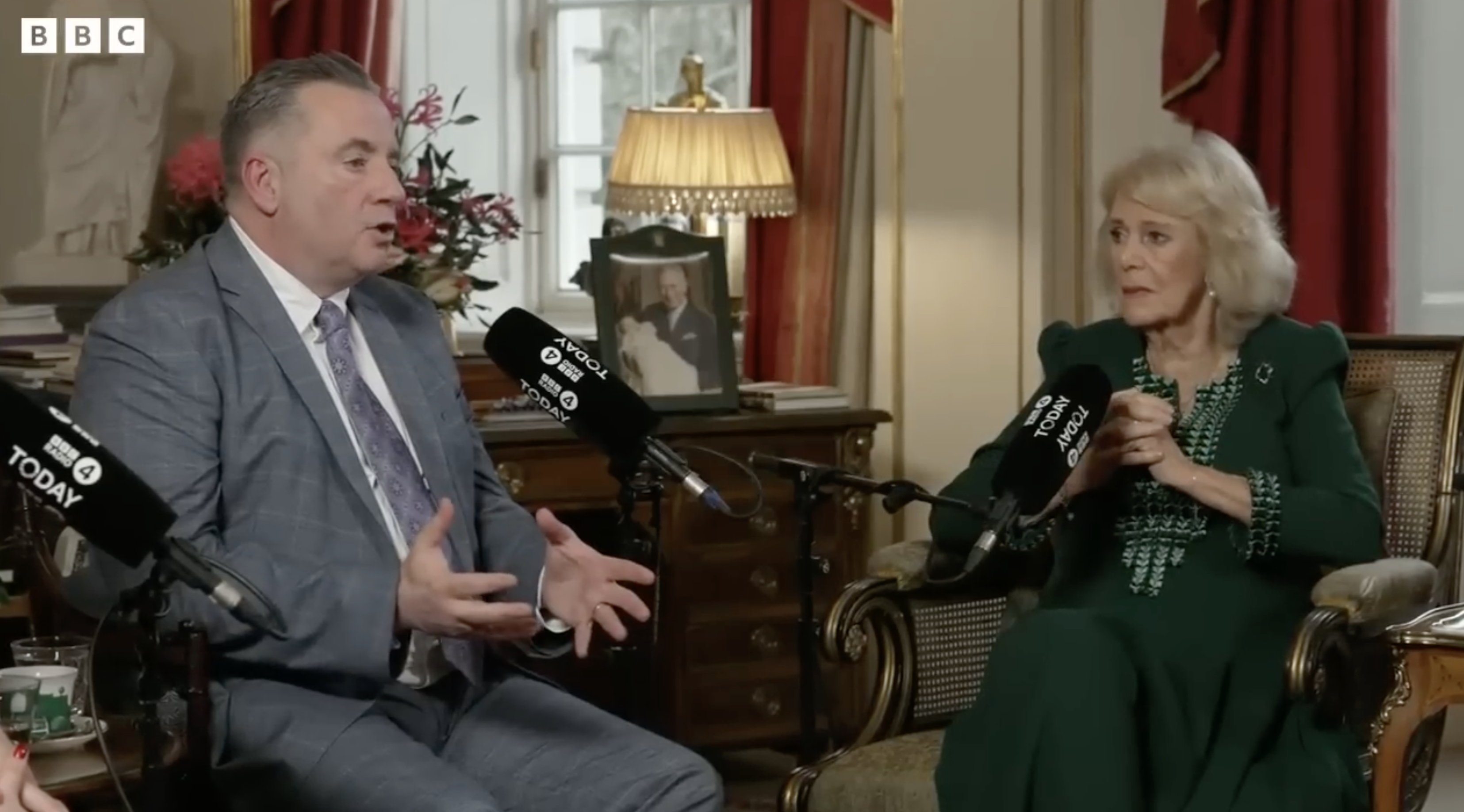 Queen Camilla chatting with John Hunt 