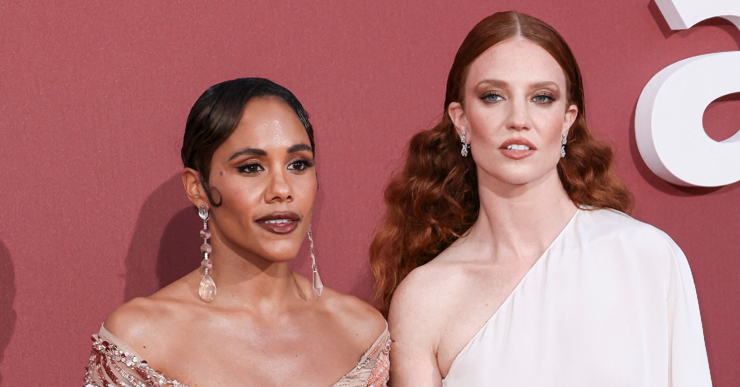 Alex Scott and Jess Glynne posing on the red carpet 
