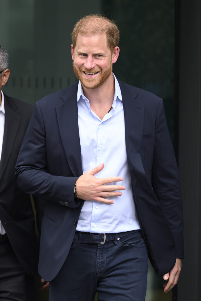 Prince Harry walking in suit