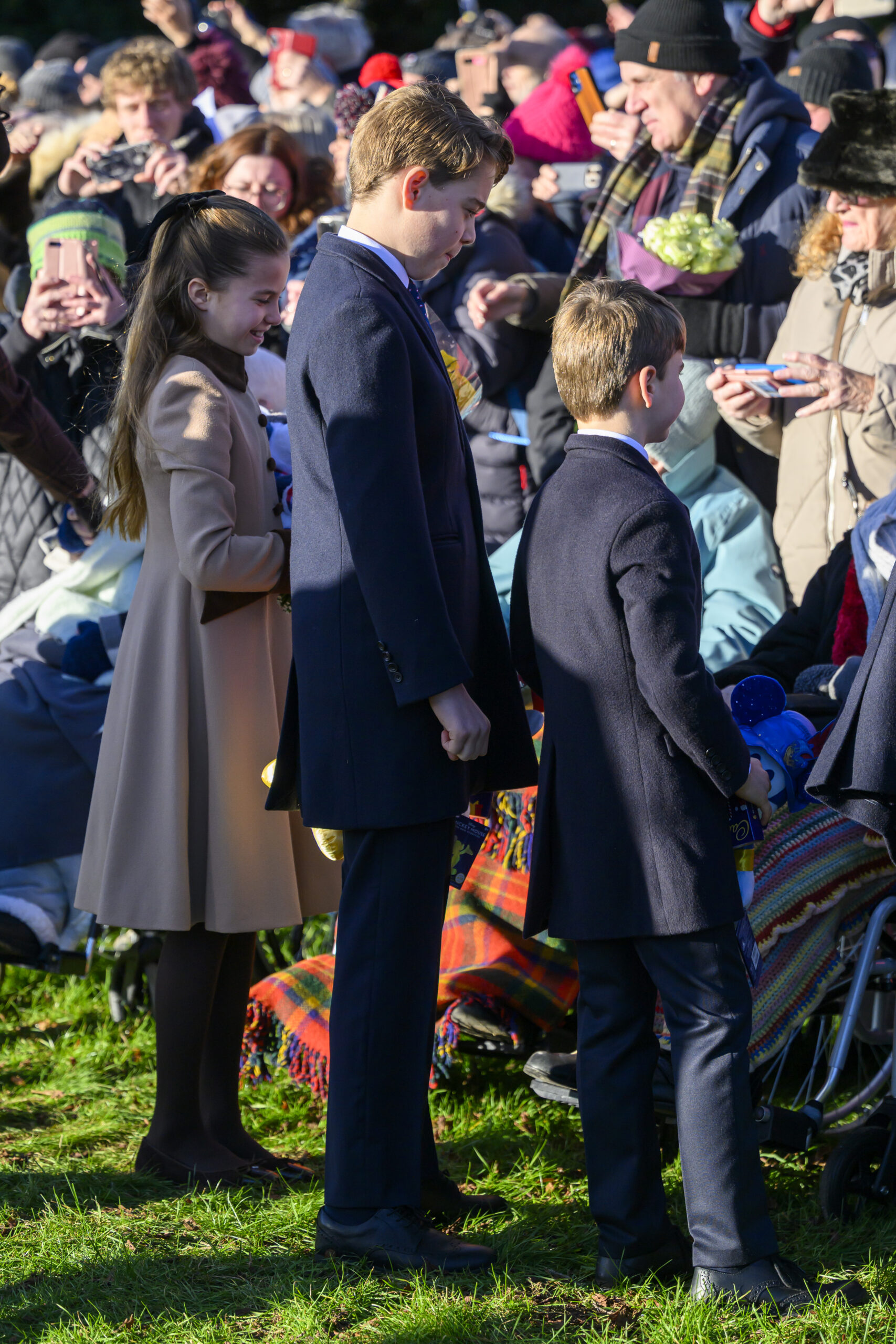 Princess Charlotte, Prince George, and Prince Louis during Christmas Day walkabout