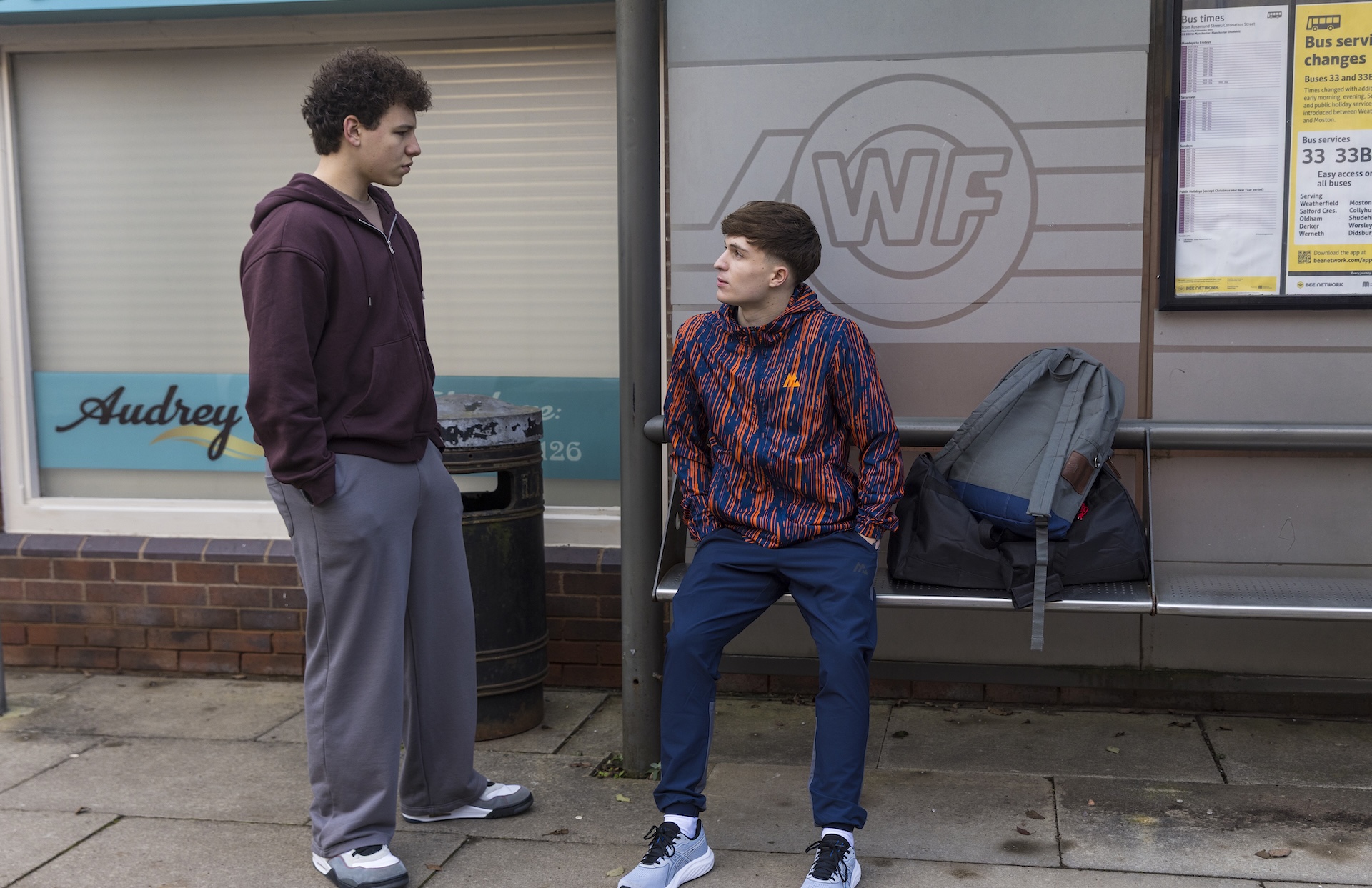Coronation Street's Will and Lee talking at the bus stop