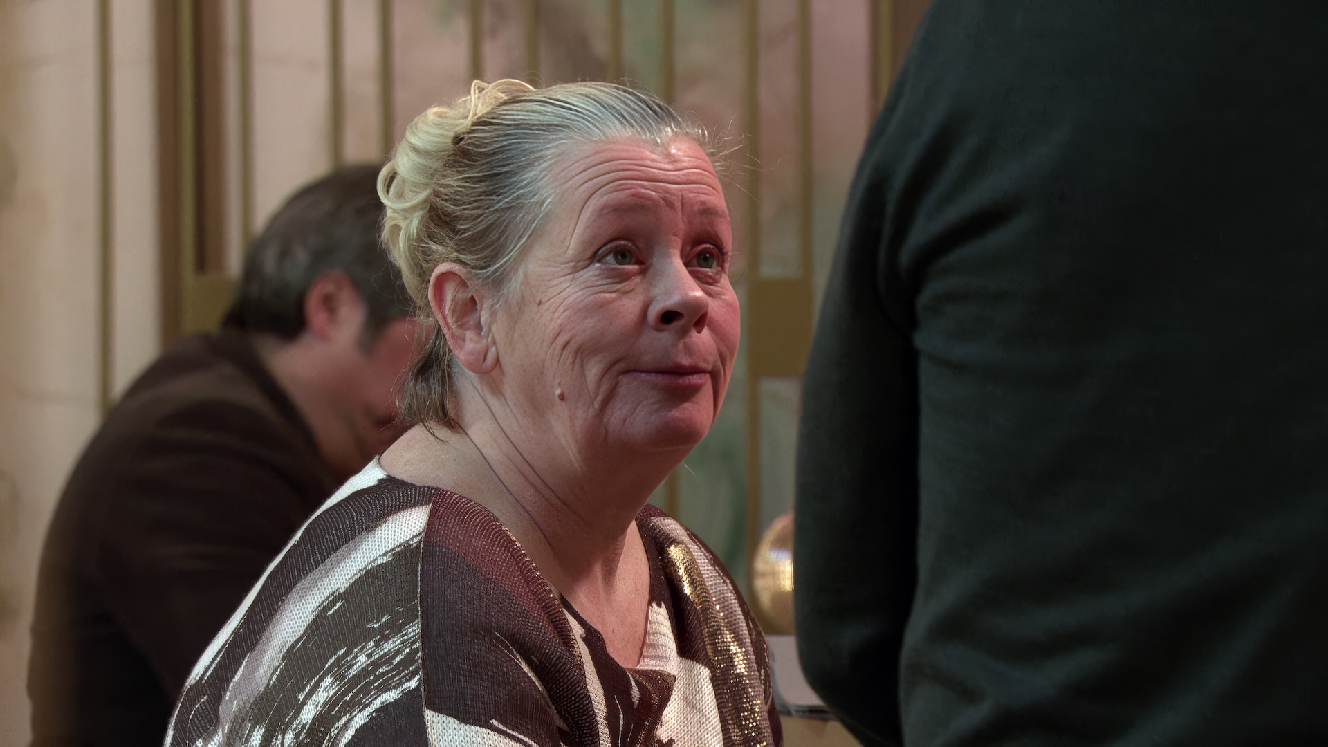 Bernie and Mal smiling at each other in Coronation Street