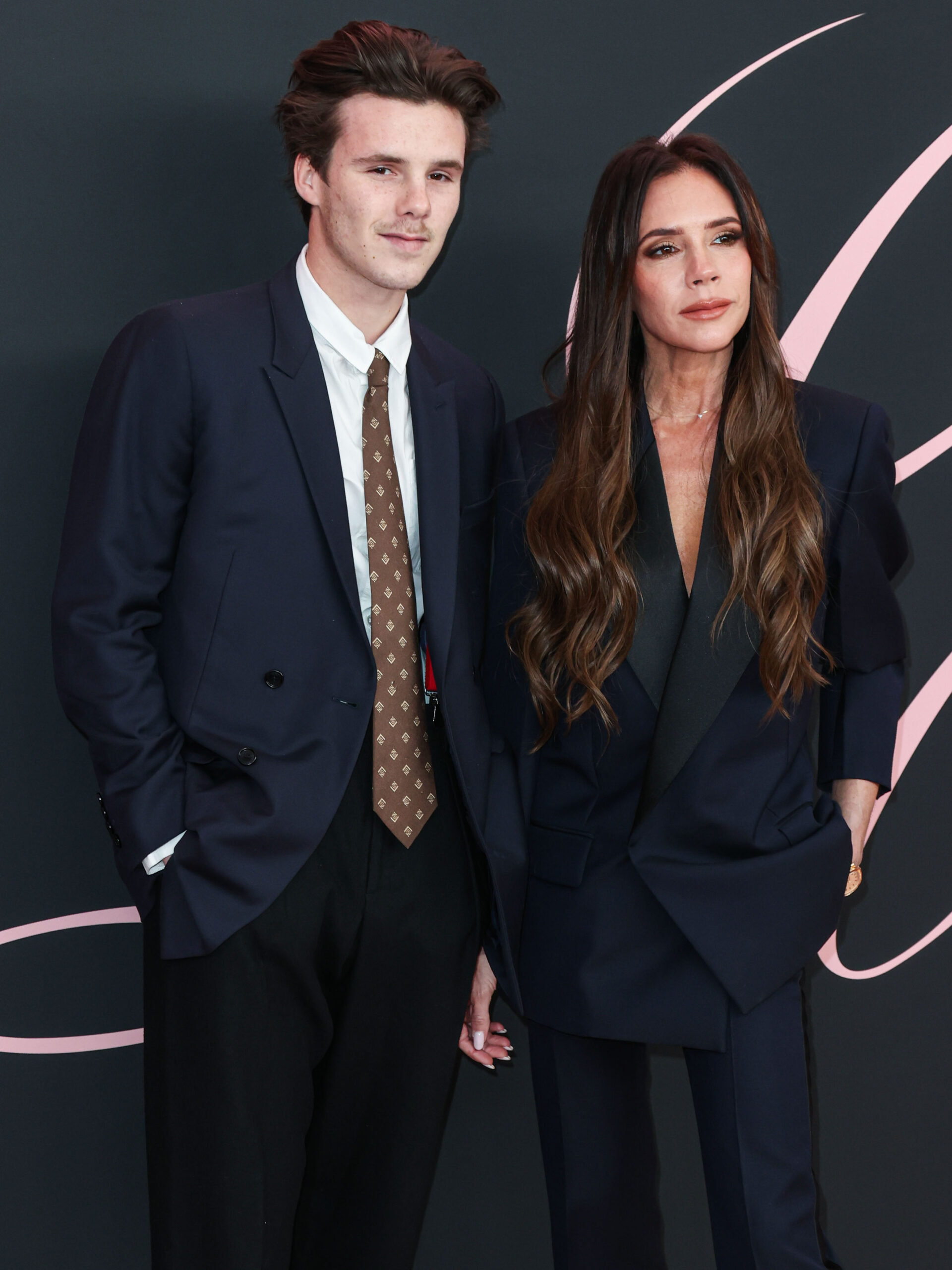 Cruz Beckham and Victoria Beckham at event 