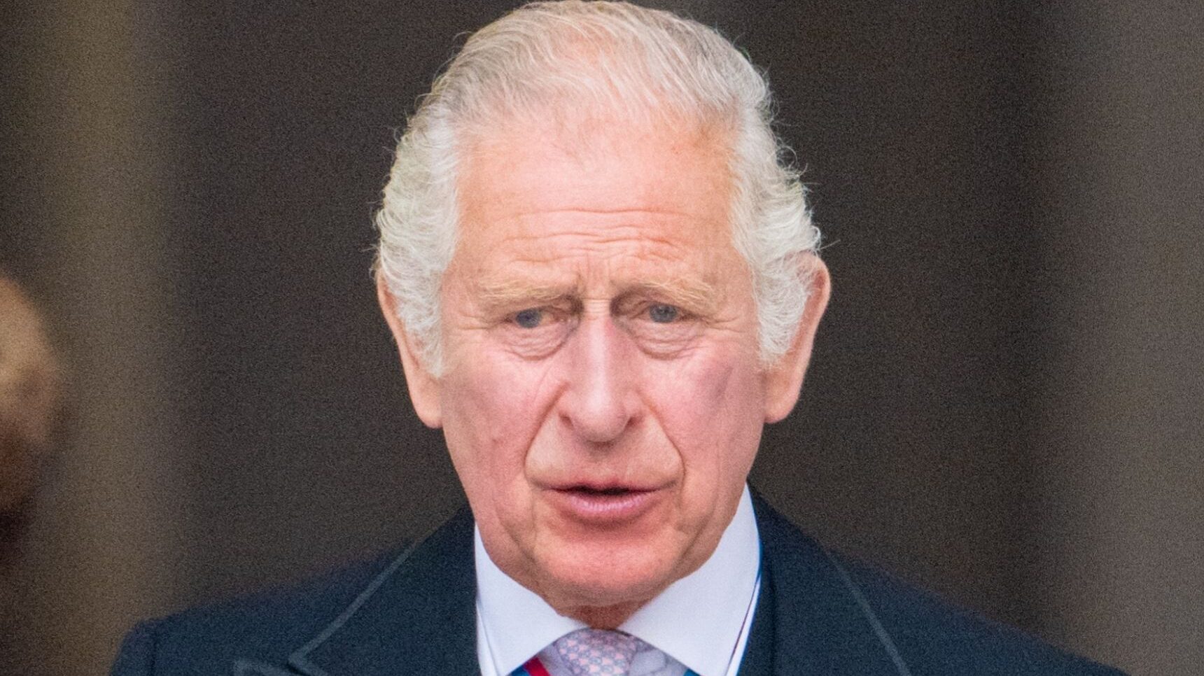 King Charles with a serious expression