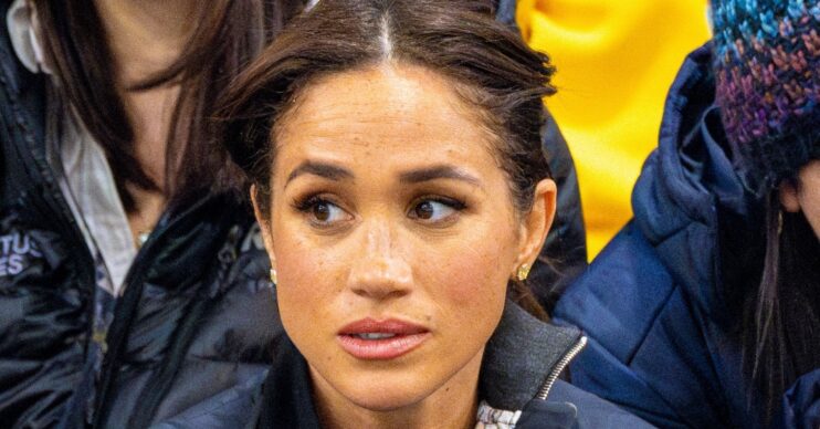 Meghan Markle frowning