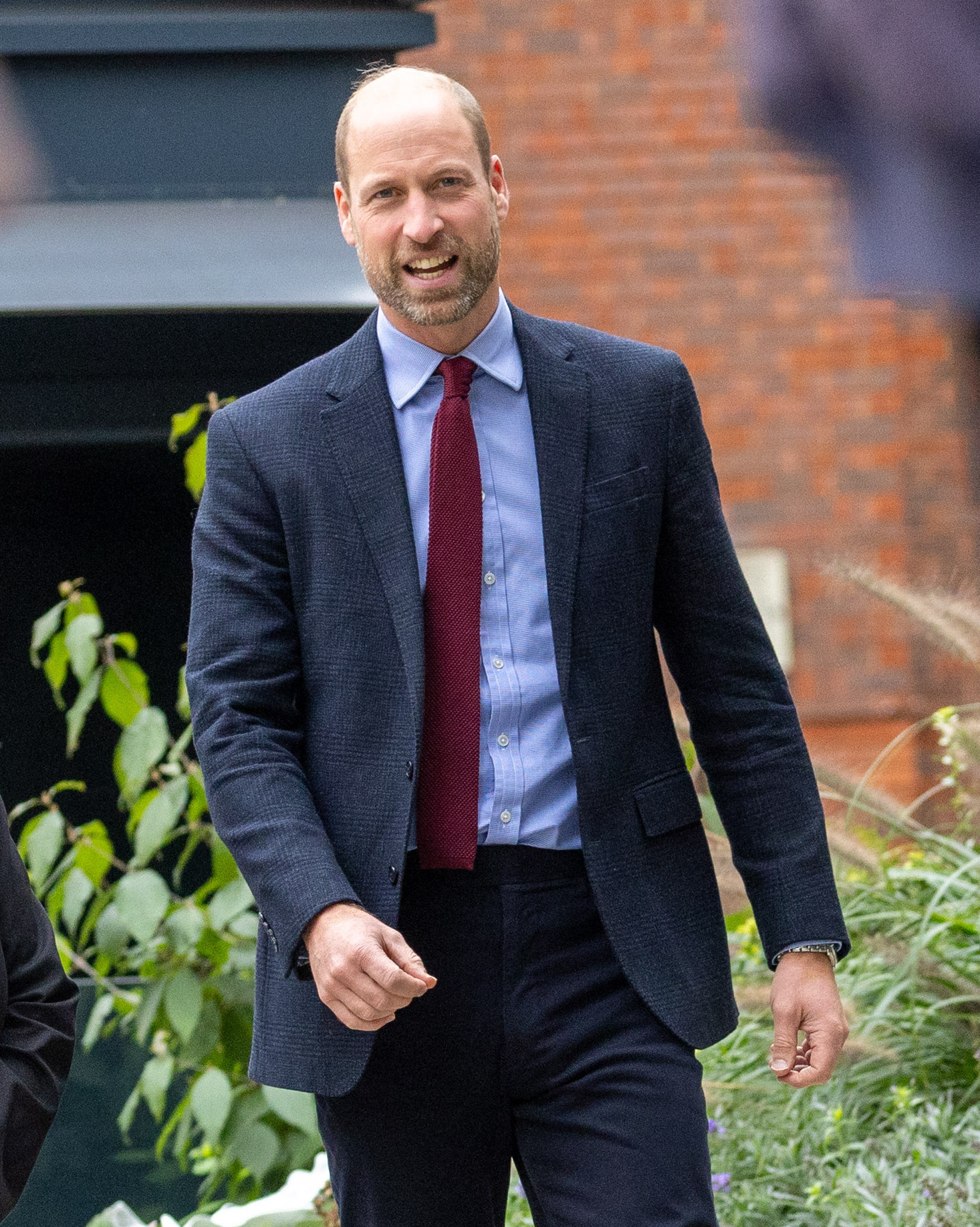 Prince William in navy suit during royal engagement