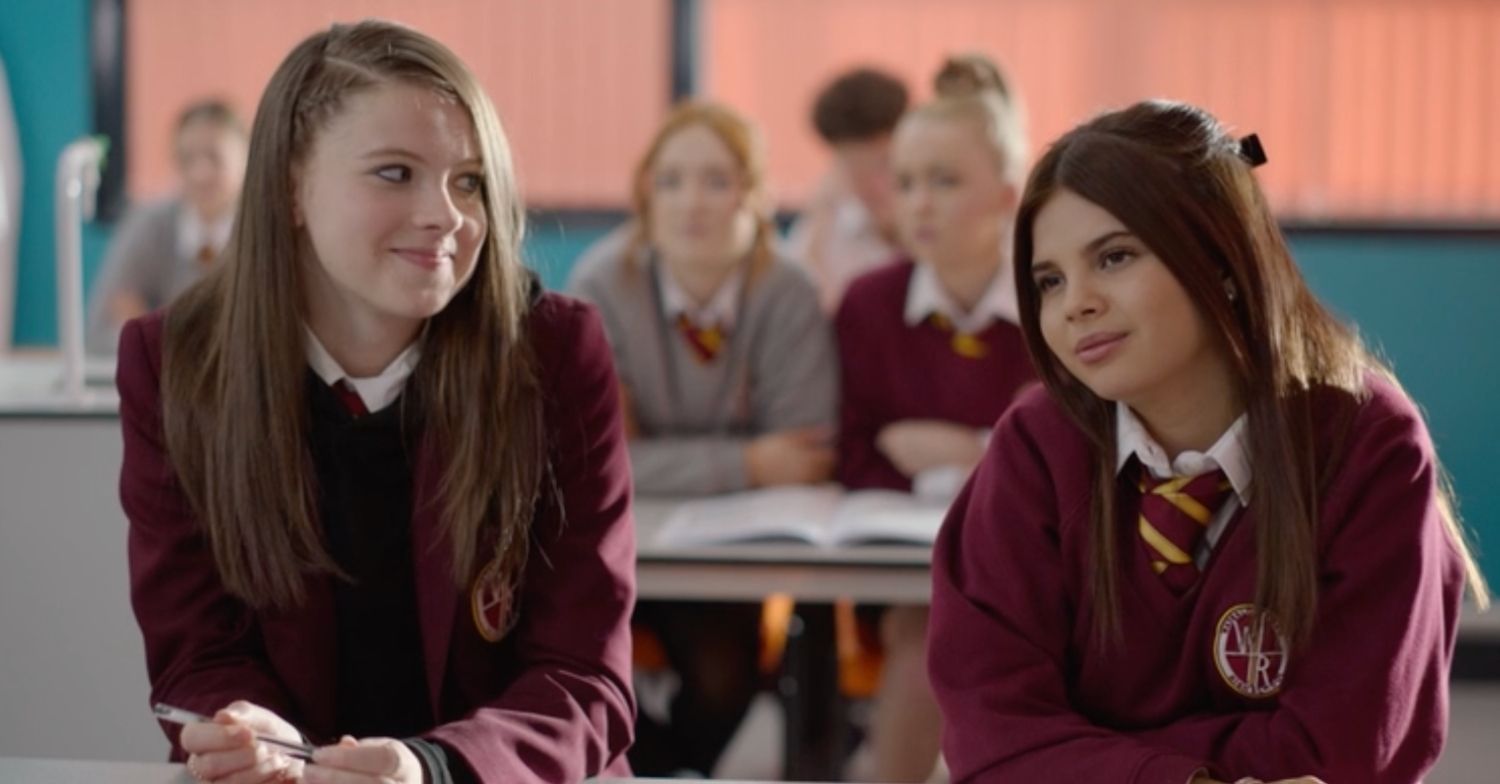 Cat smiling at Izzy in Waterloo Road series 17