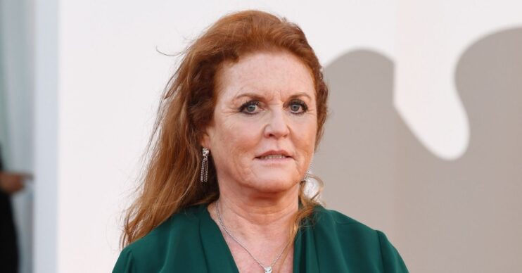 Sarah Ferguson in green dress with serious expression