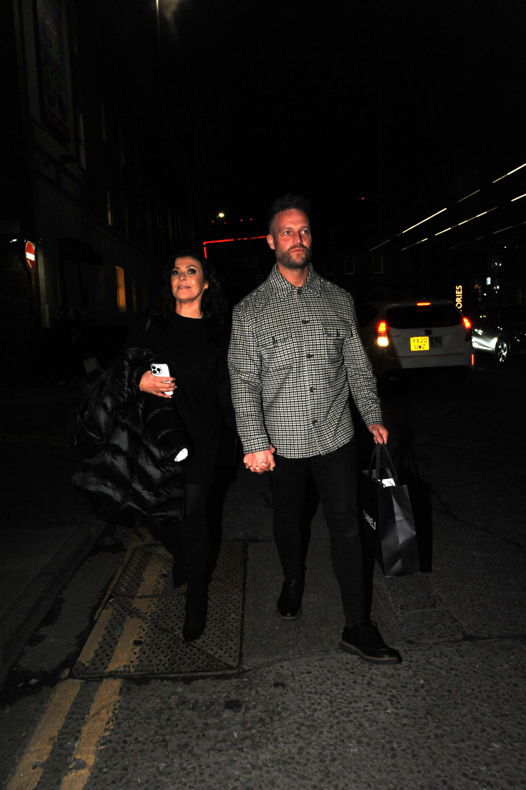 Kym Marsh and Tom Dickinson walking