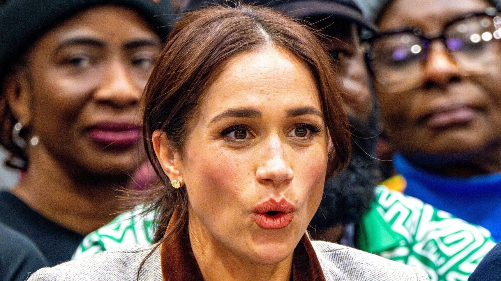 Meghan Markle with a shocked expression