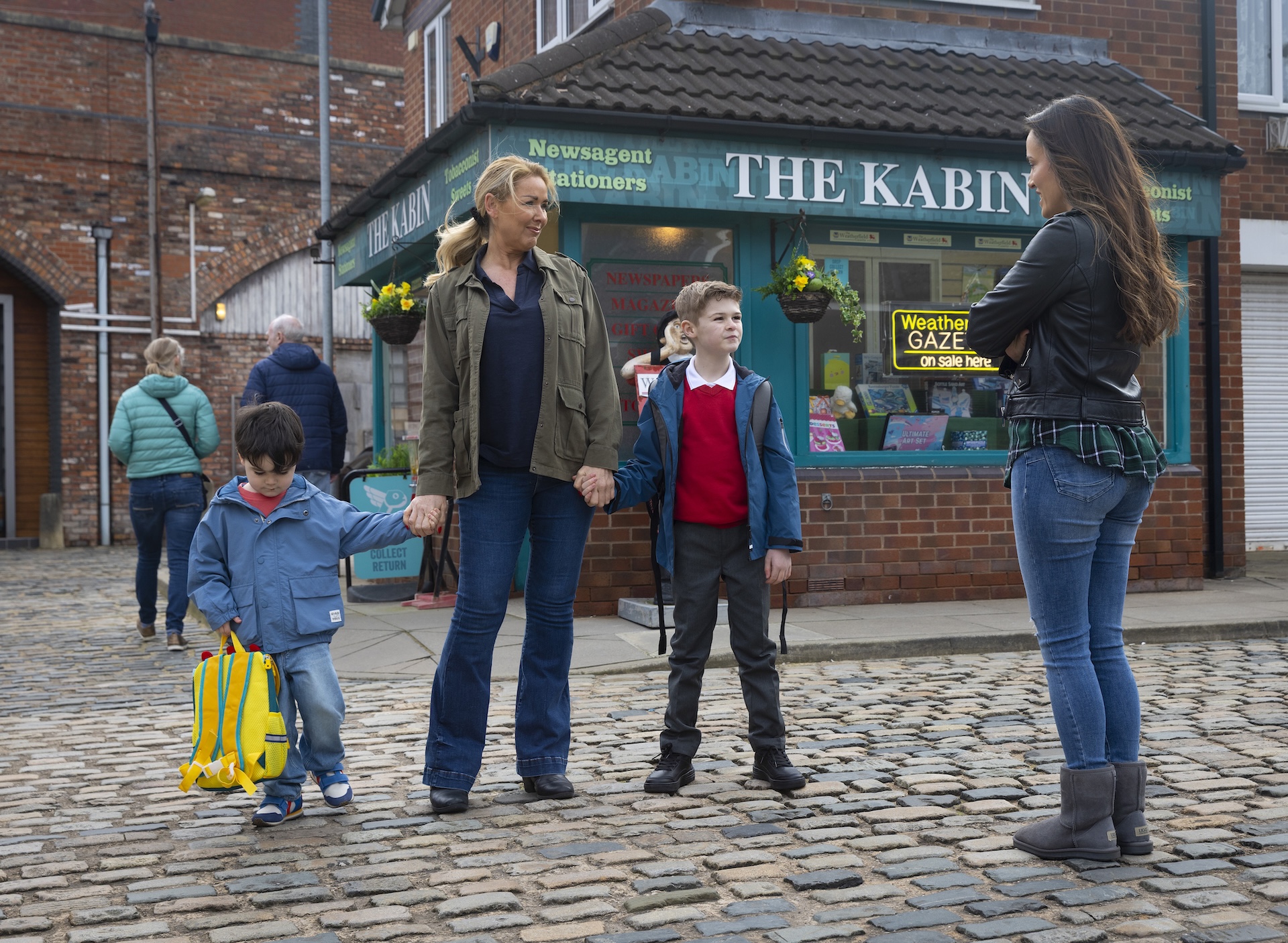 Cassie and the kids talking to Jodie on the Street