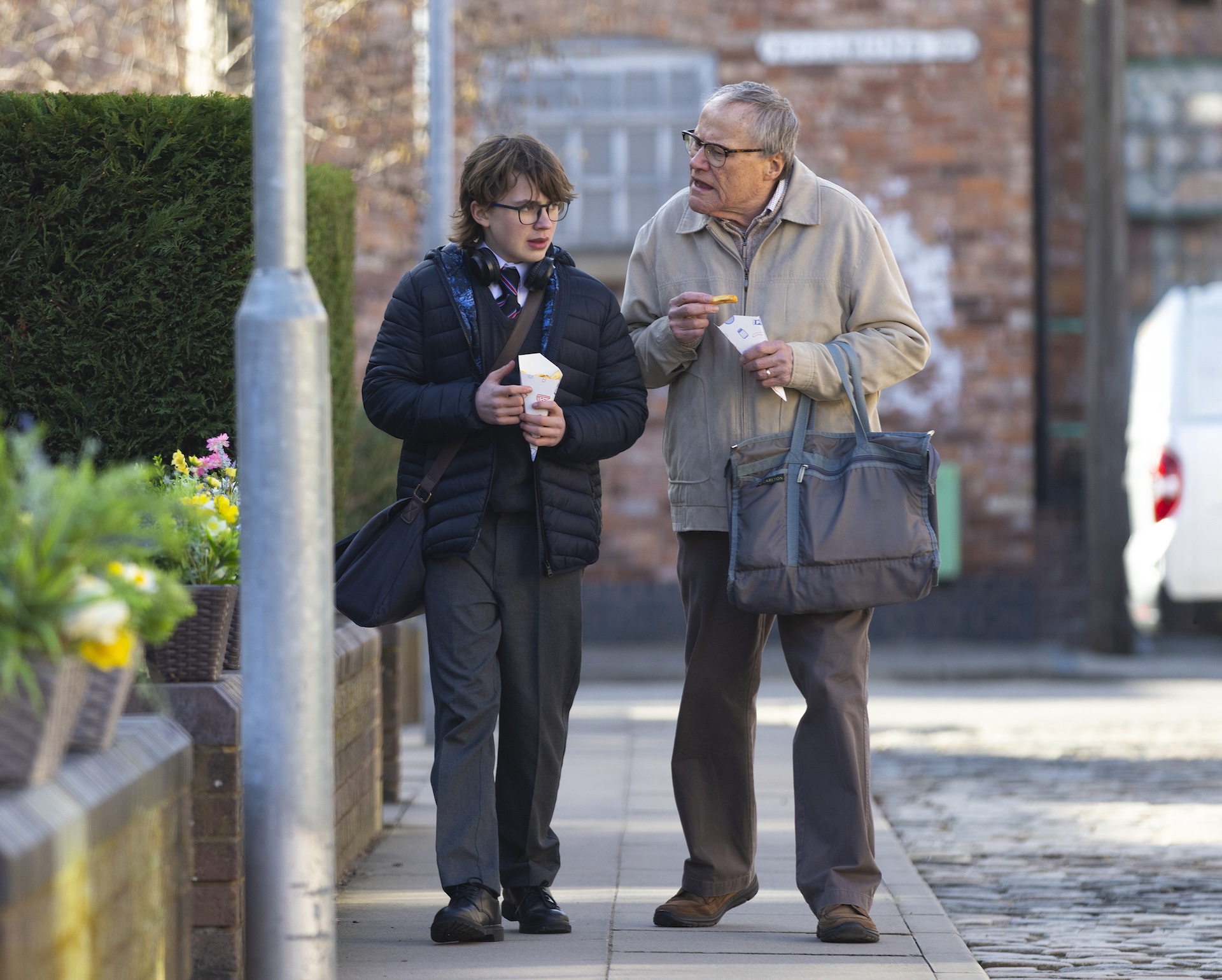 Roy and Sam eating chips in Coronation Street