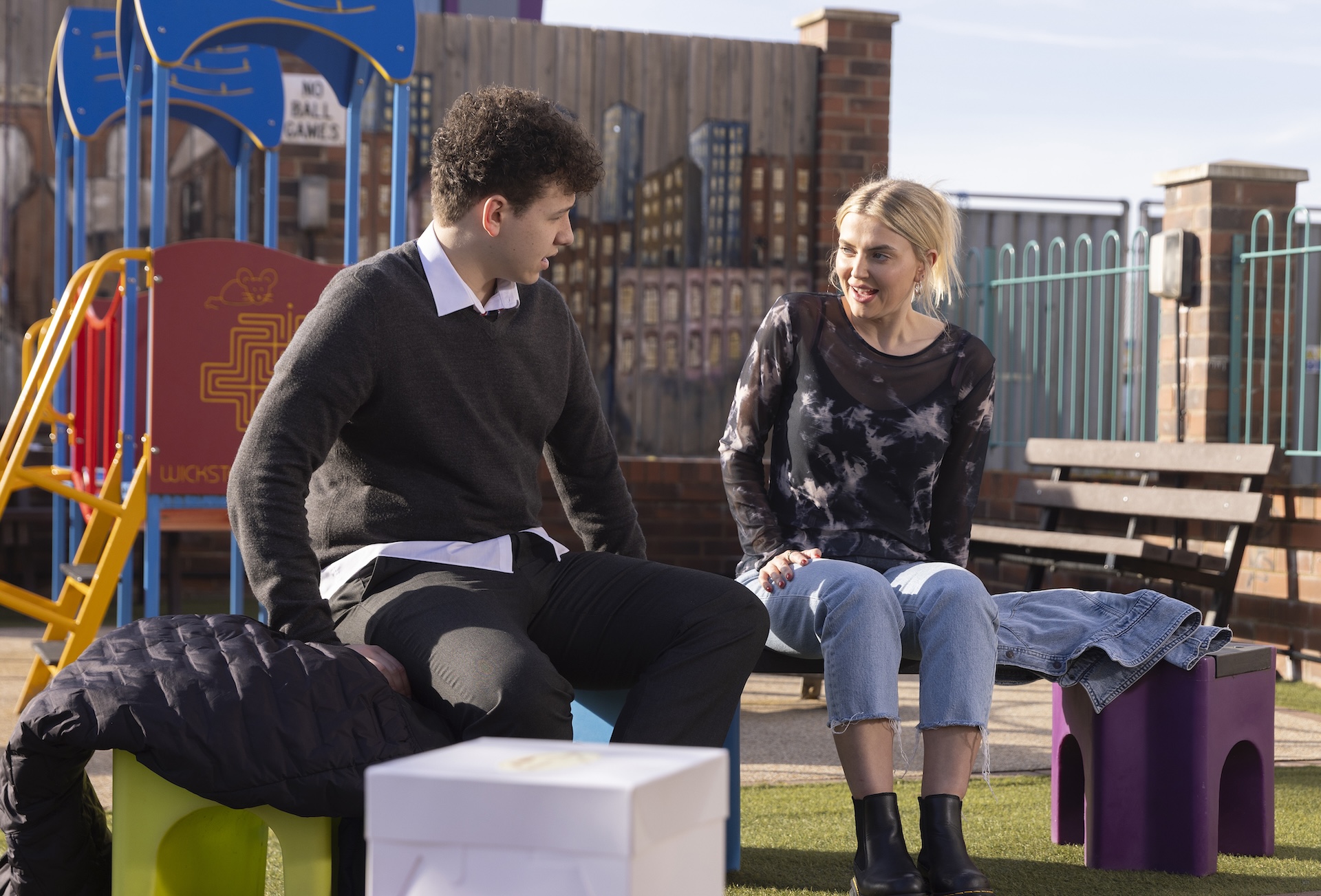 Will and Bethany talking at the precinct