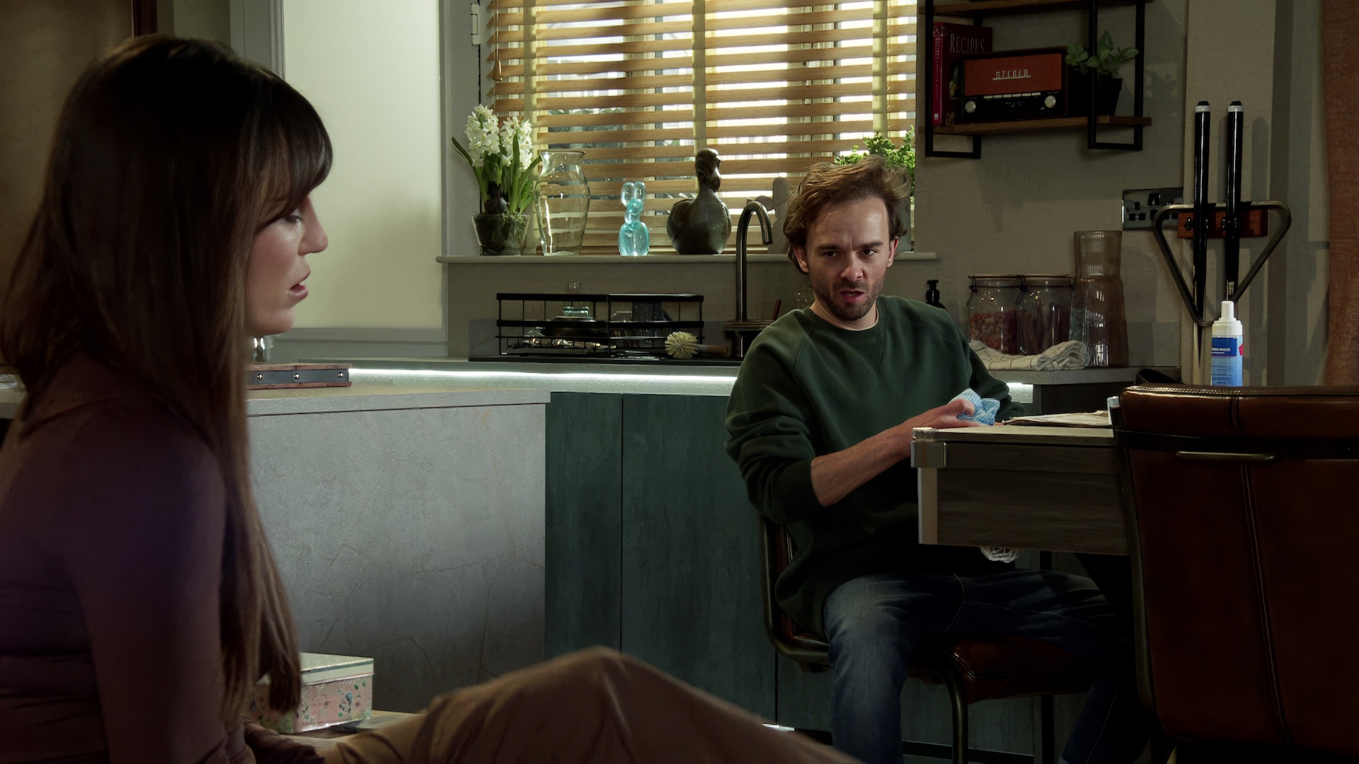 David and Jodie talking with confusion in Coronation Street