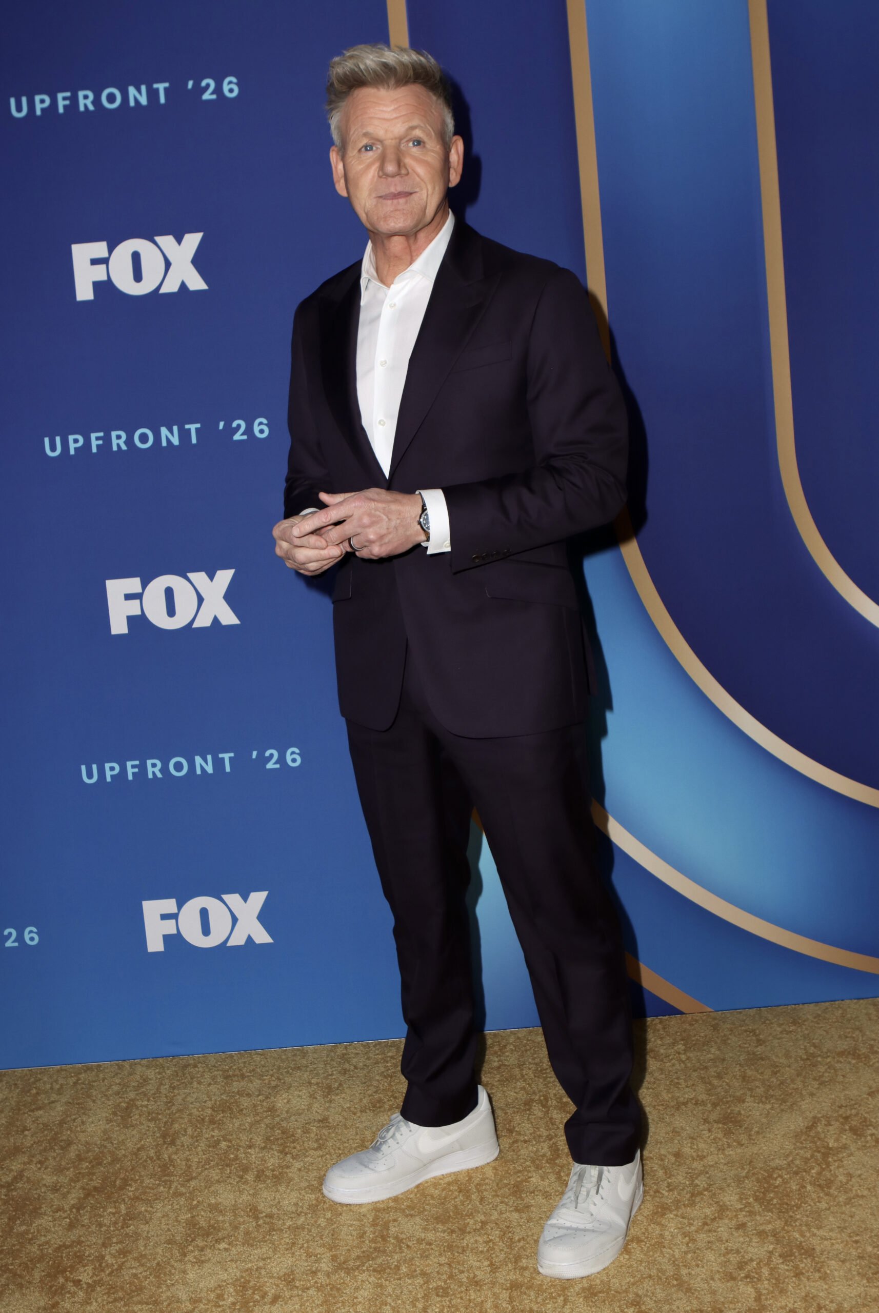 Gordon Ramsay on the red carpet in a black suit
