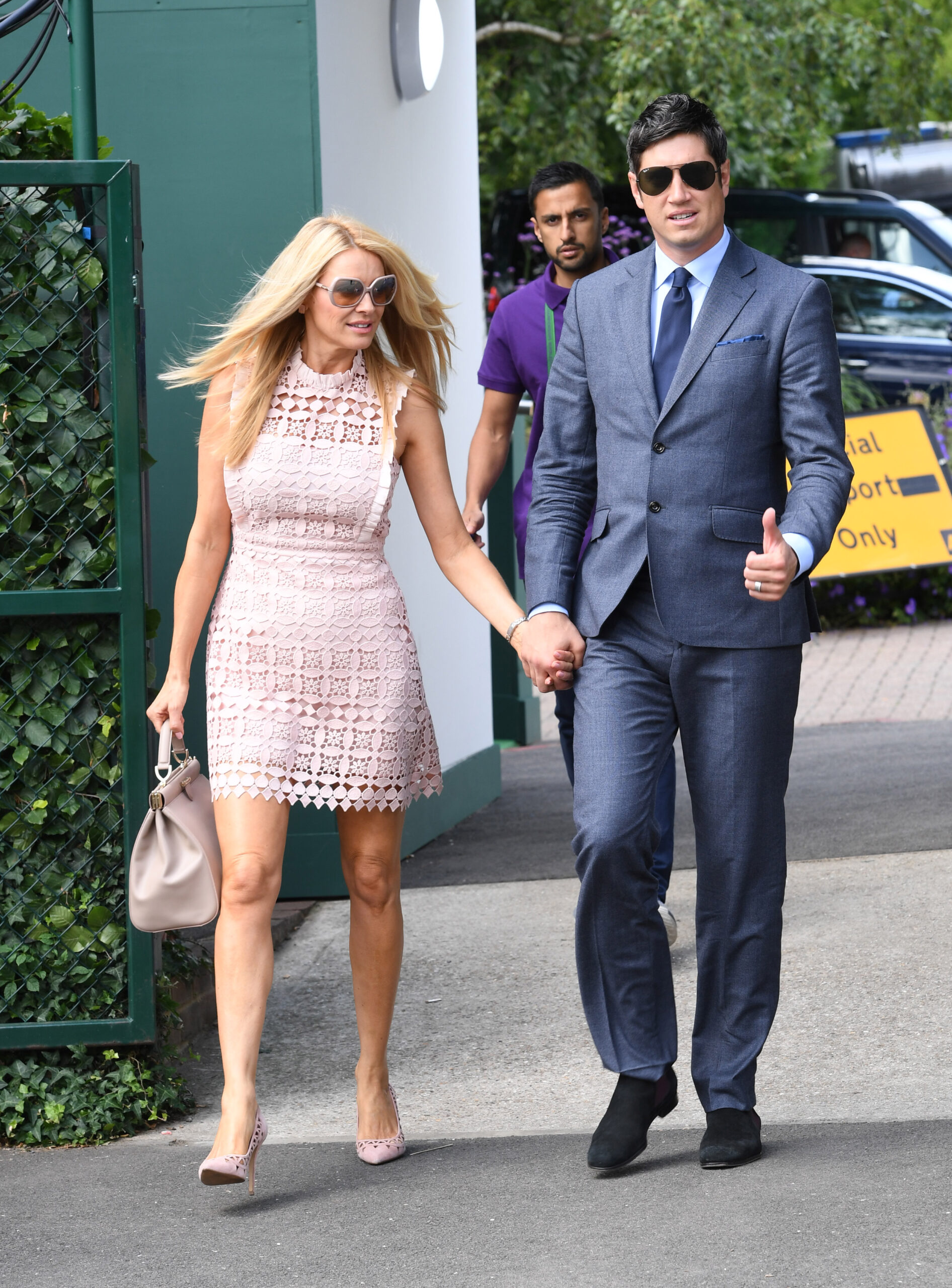 Tess Daly and Vernon Kay holding hands