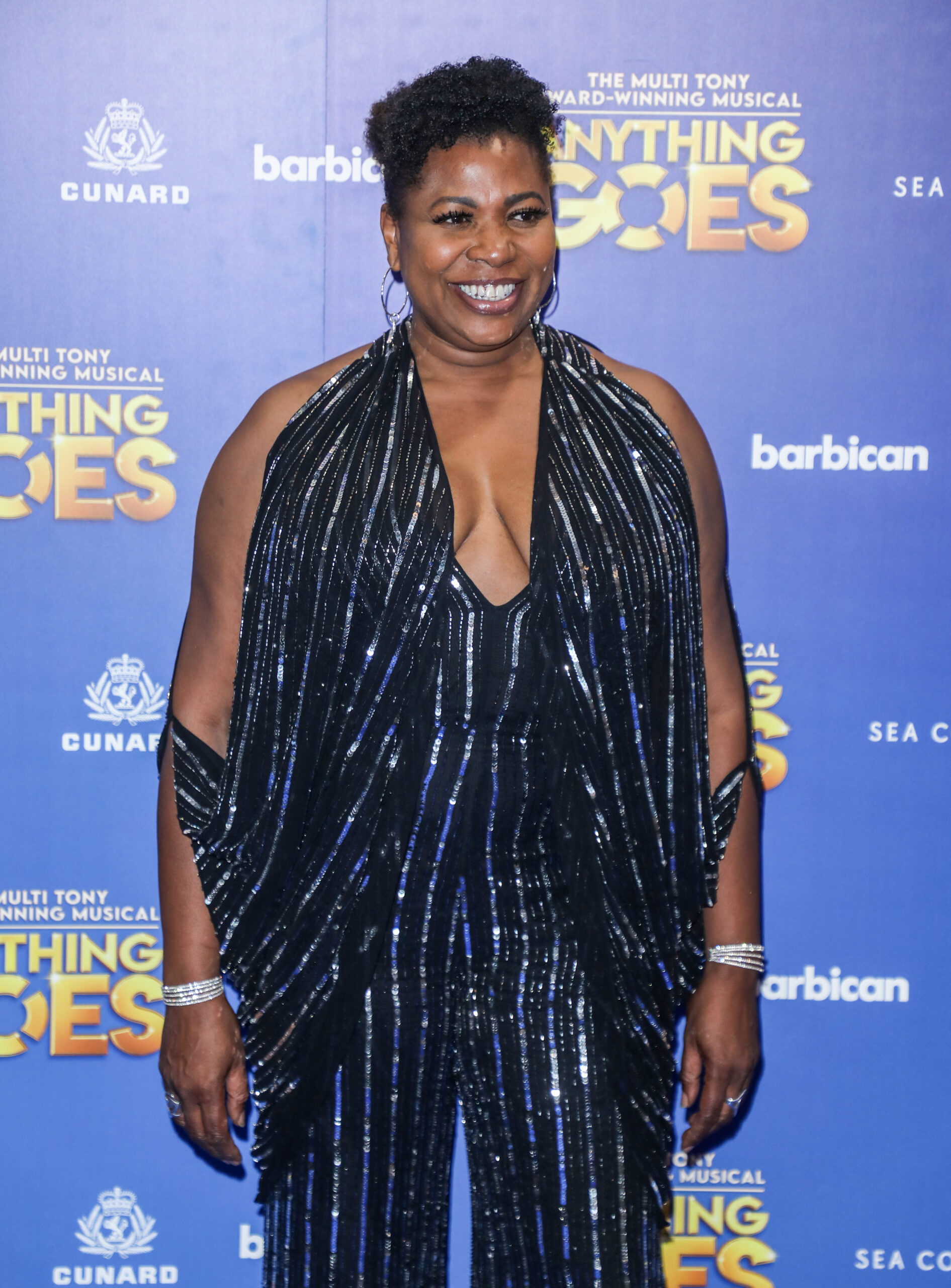 Brenda Edwards smiling in sequins