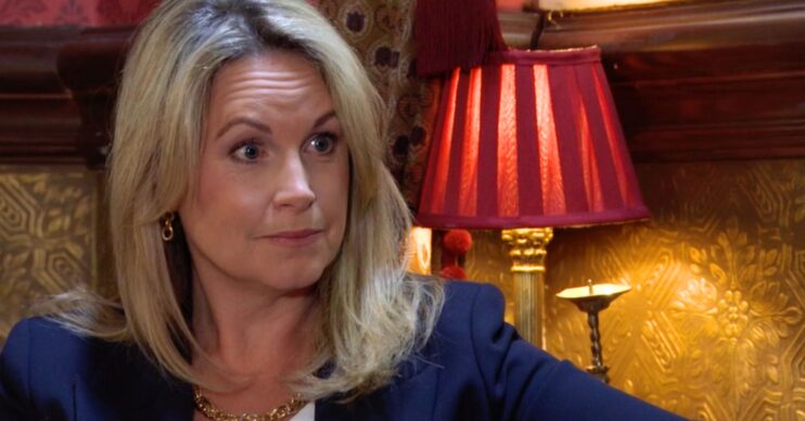 Sam looking surprised in EastEnders