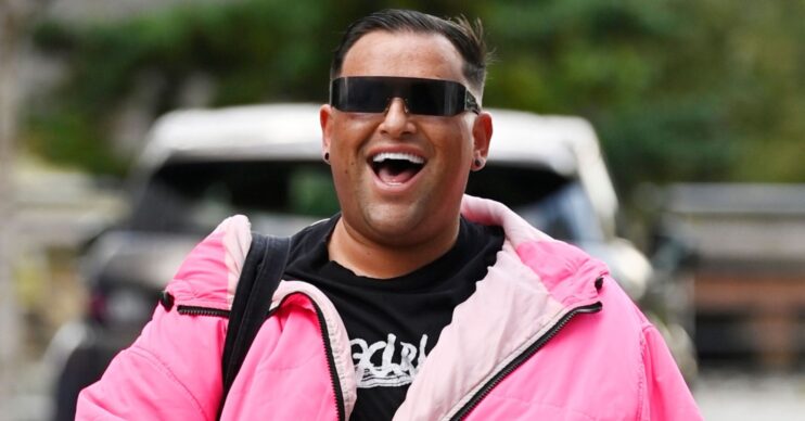 David Potts in pink coat