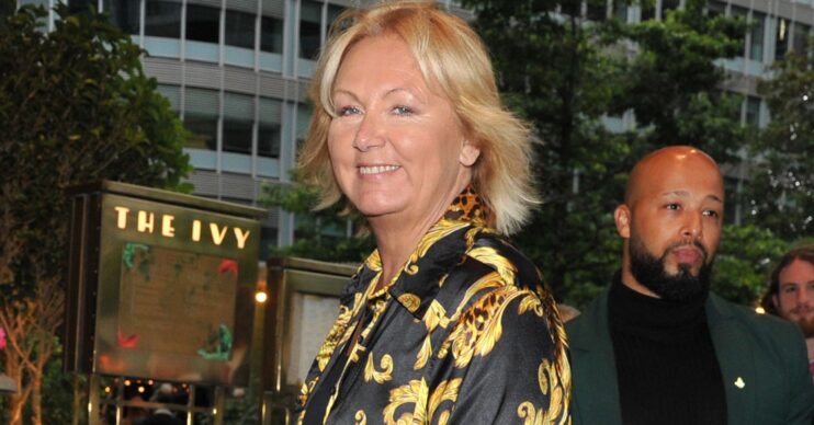Sue Cleaver black and gold blouse