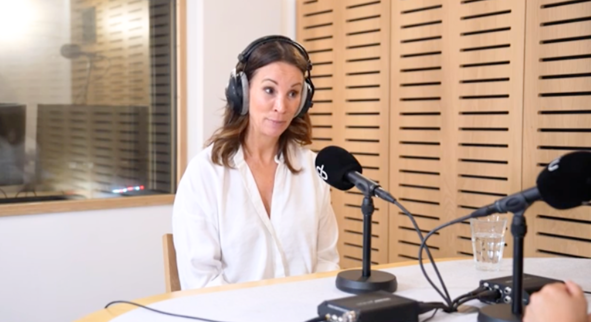 Andrea McLean on a podcast
