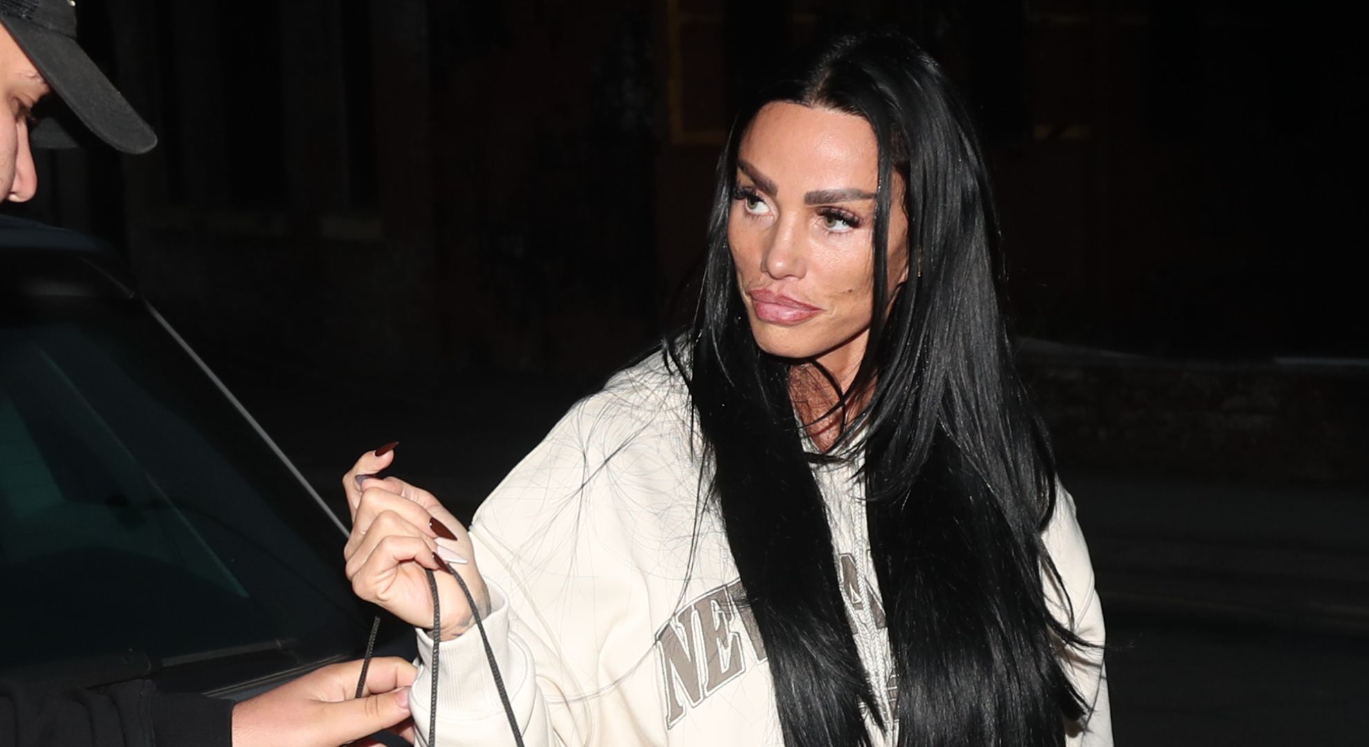 Katie Price looking up