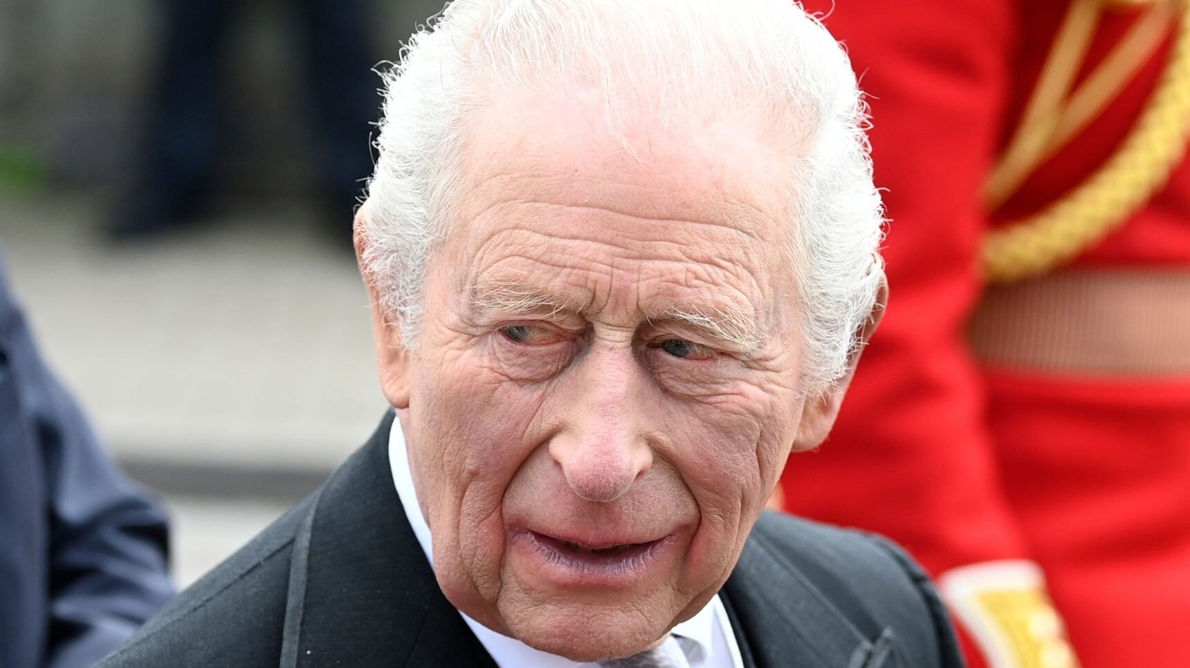 King Charles frowning