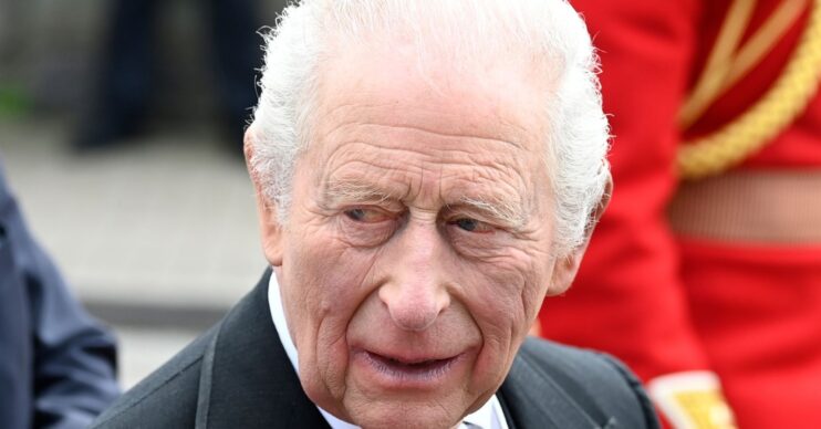 King Charles frowning