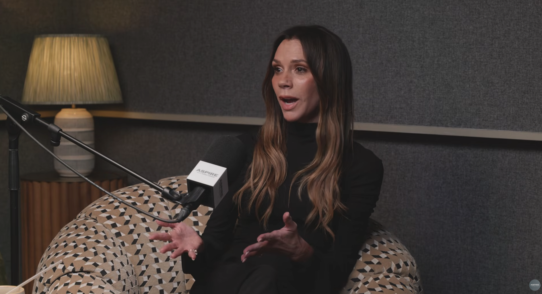 Victoria Beckham speaking on a podcast