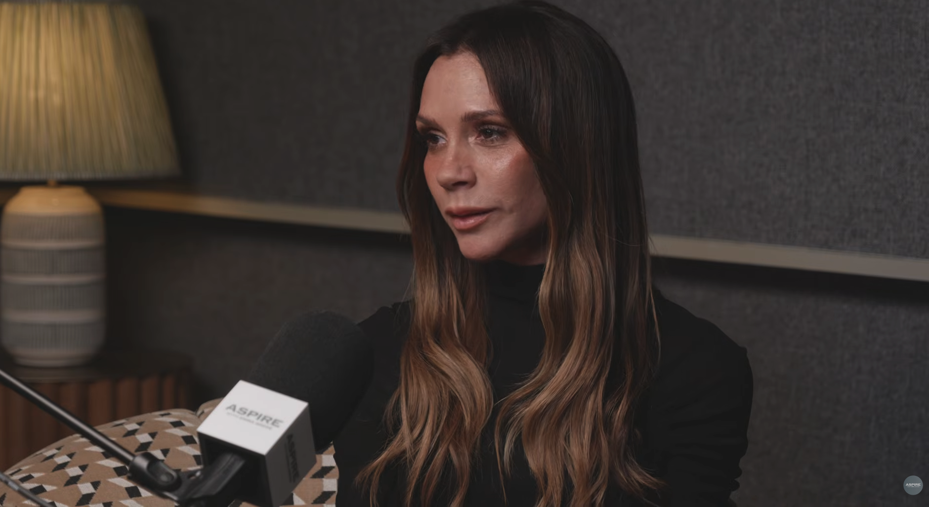 Victoria Beckham speaking on a podcast