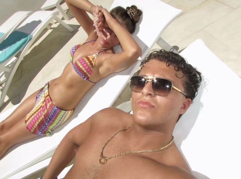 Venezuela Fury and Noah Price sunbathing on their honeymoon