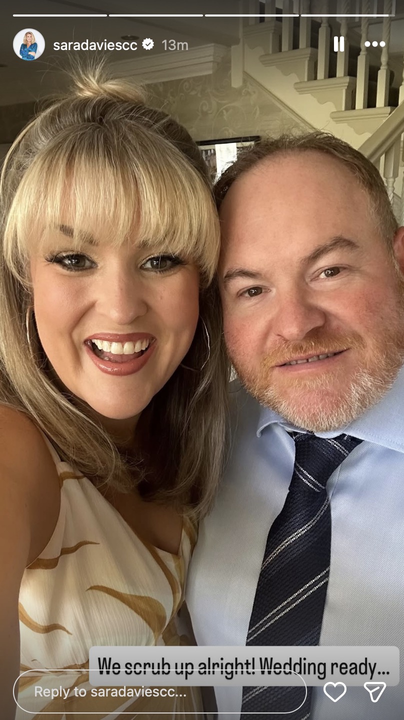 Sara Davies and husband Simon at a wedding