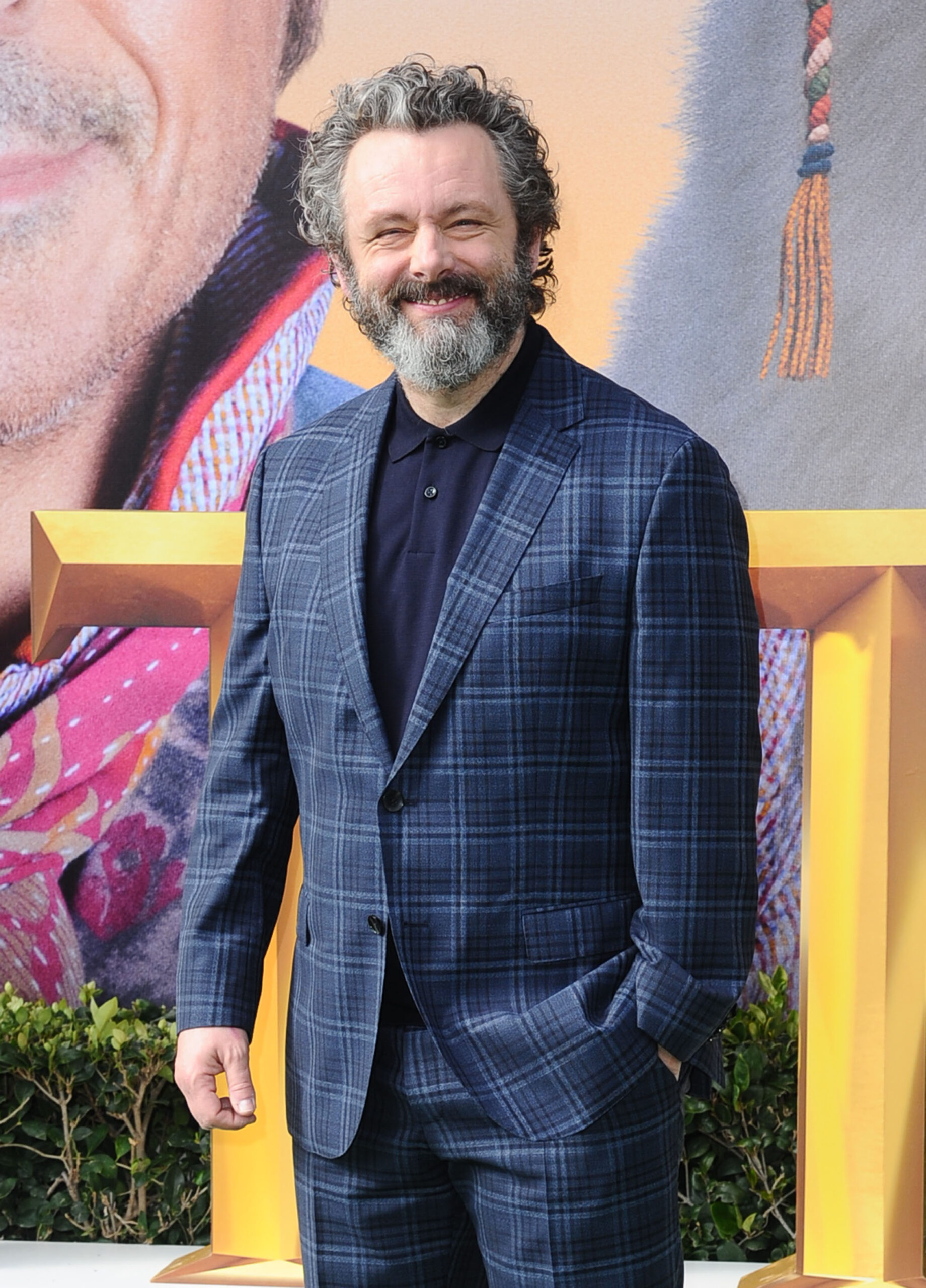 Michael Sheen in a suit 