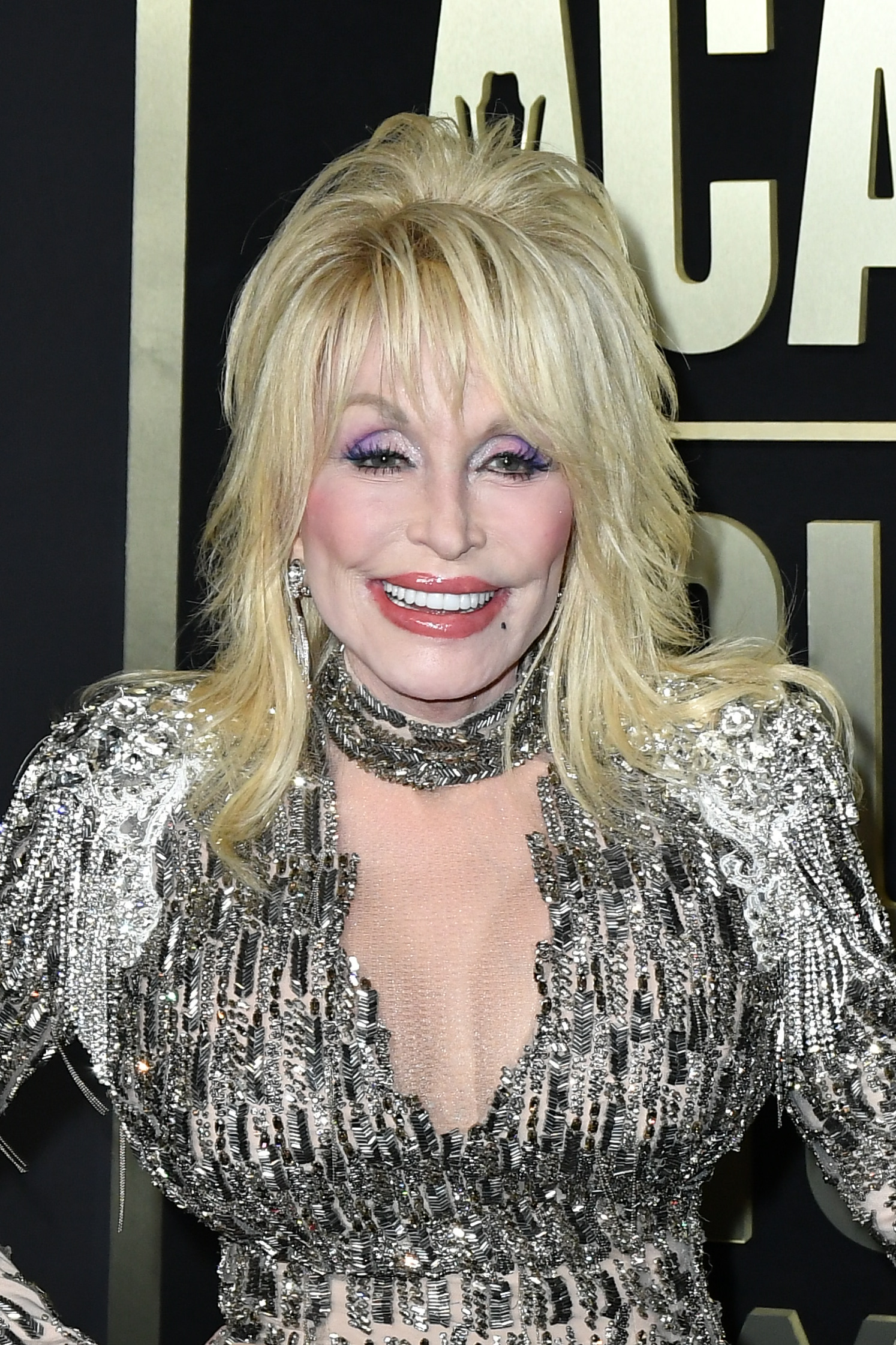 Dolly Parton smiling on stage