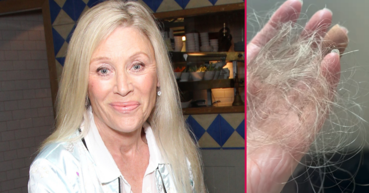Angie Best smiling and holding her hair