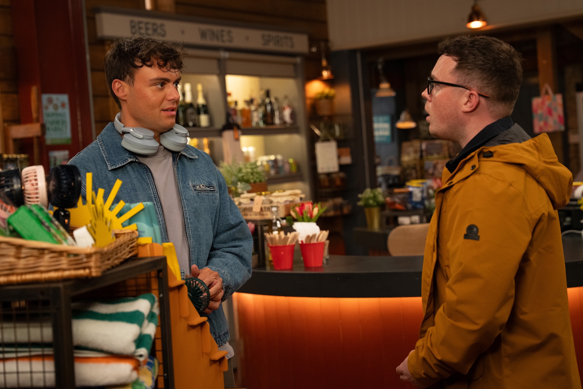Lewis looks nervous as Vinny talks to him in Emmerdale spoilers
