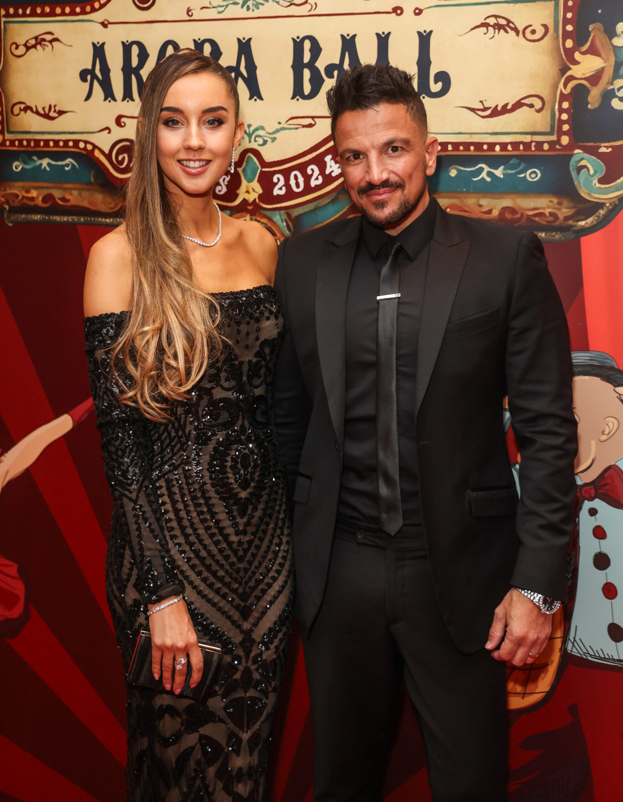 Emily and Peter Andre posing