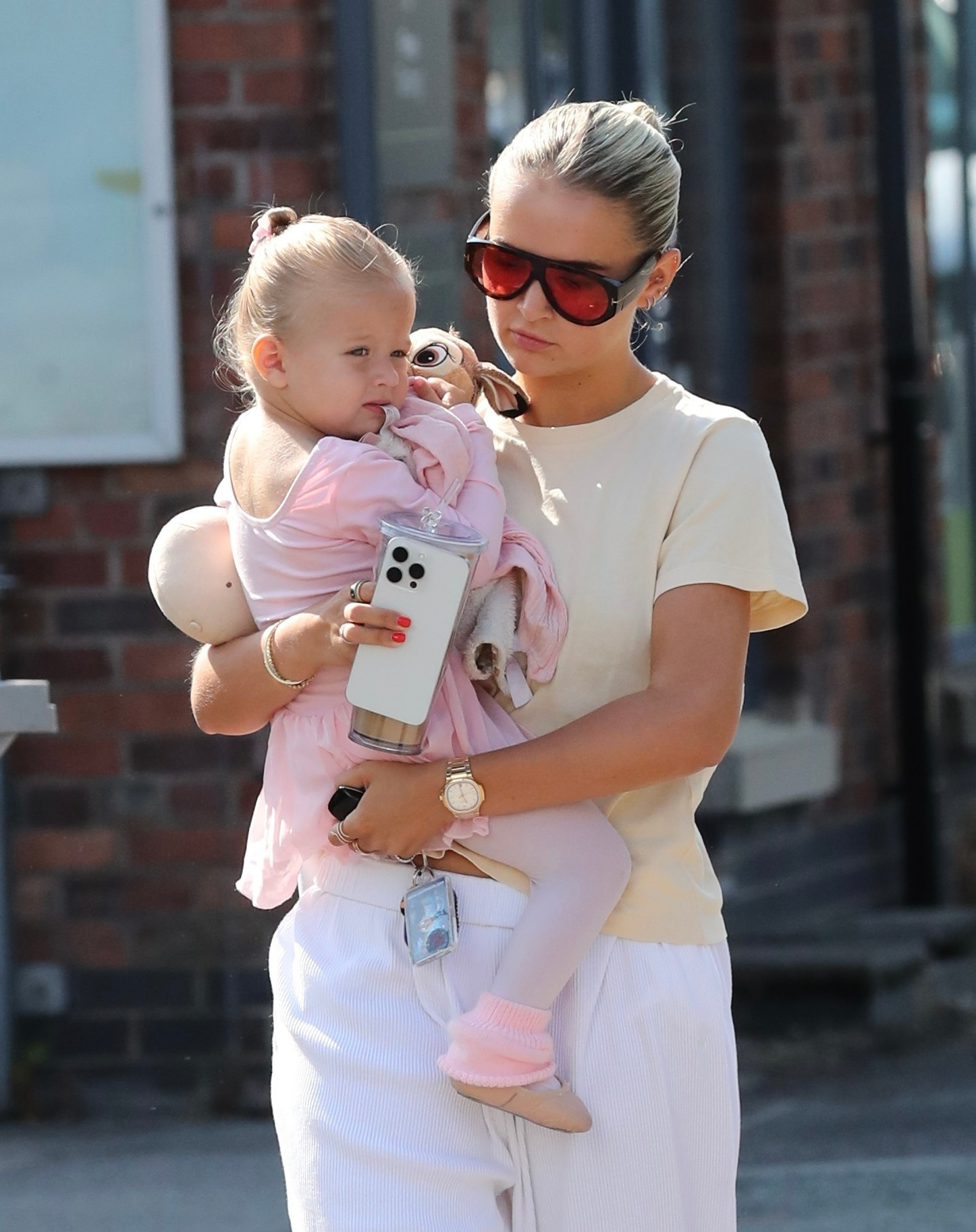 Molly-Mae carrying her daughter Bambi Fury