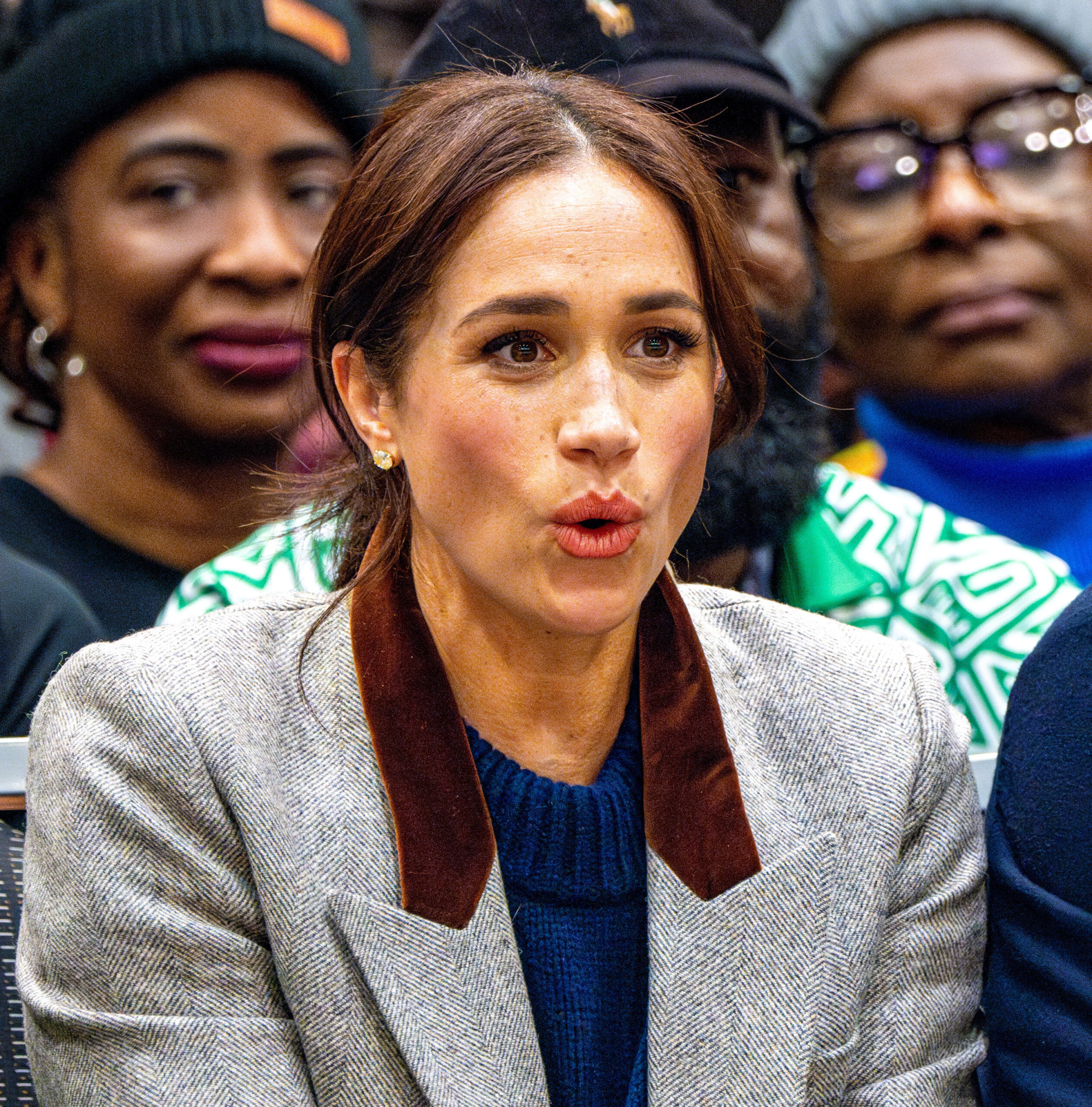Meghan Markle with a shocked expression