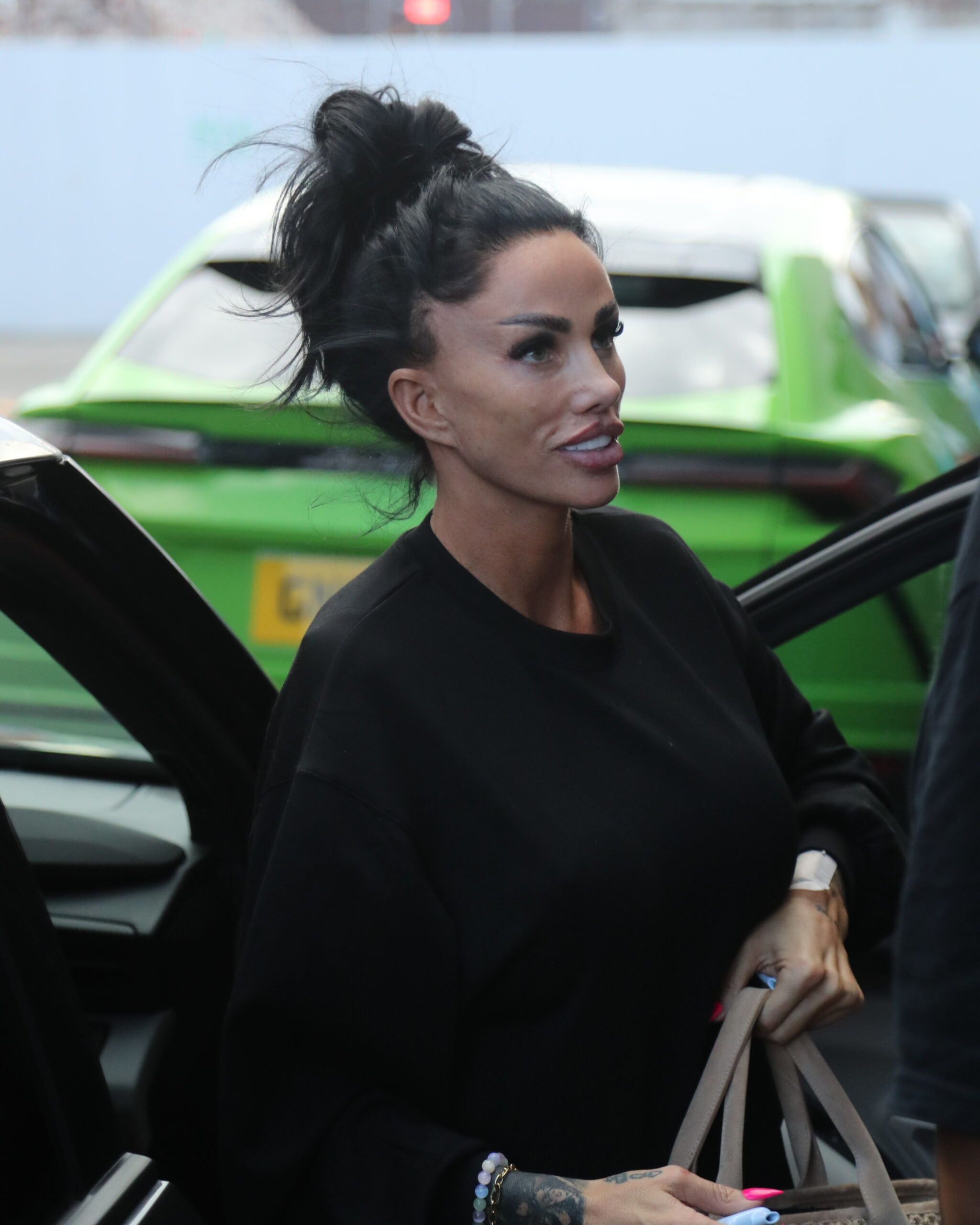 Katie Price getting out of a car