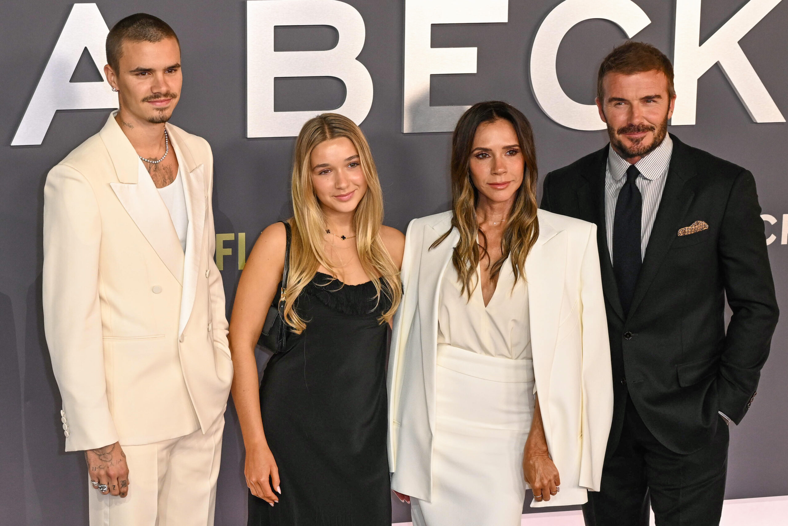 Harper and David and Victoria Beckham