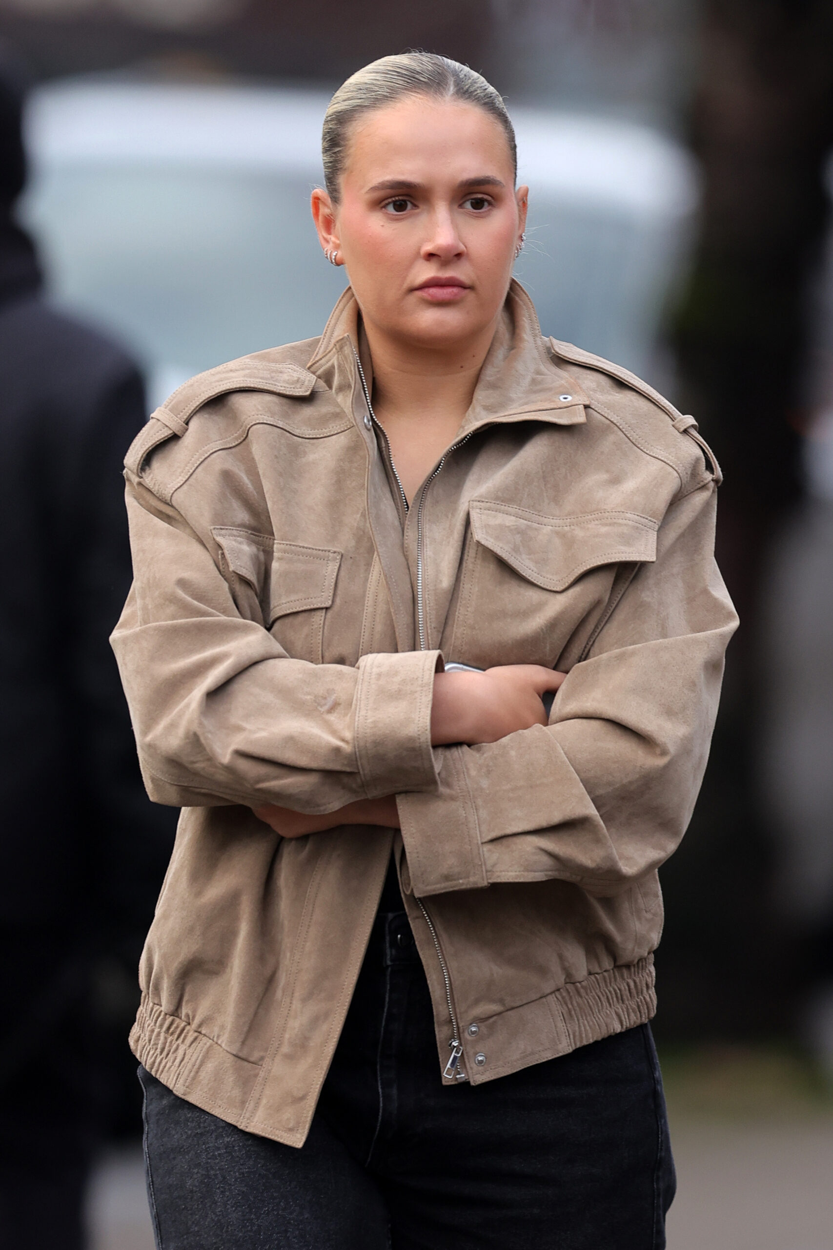 Molly-Mae Hague with a serious expression with her arms folded