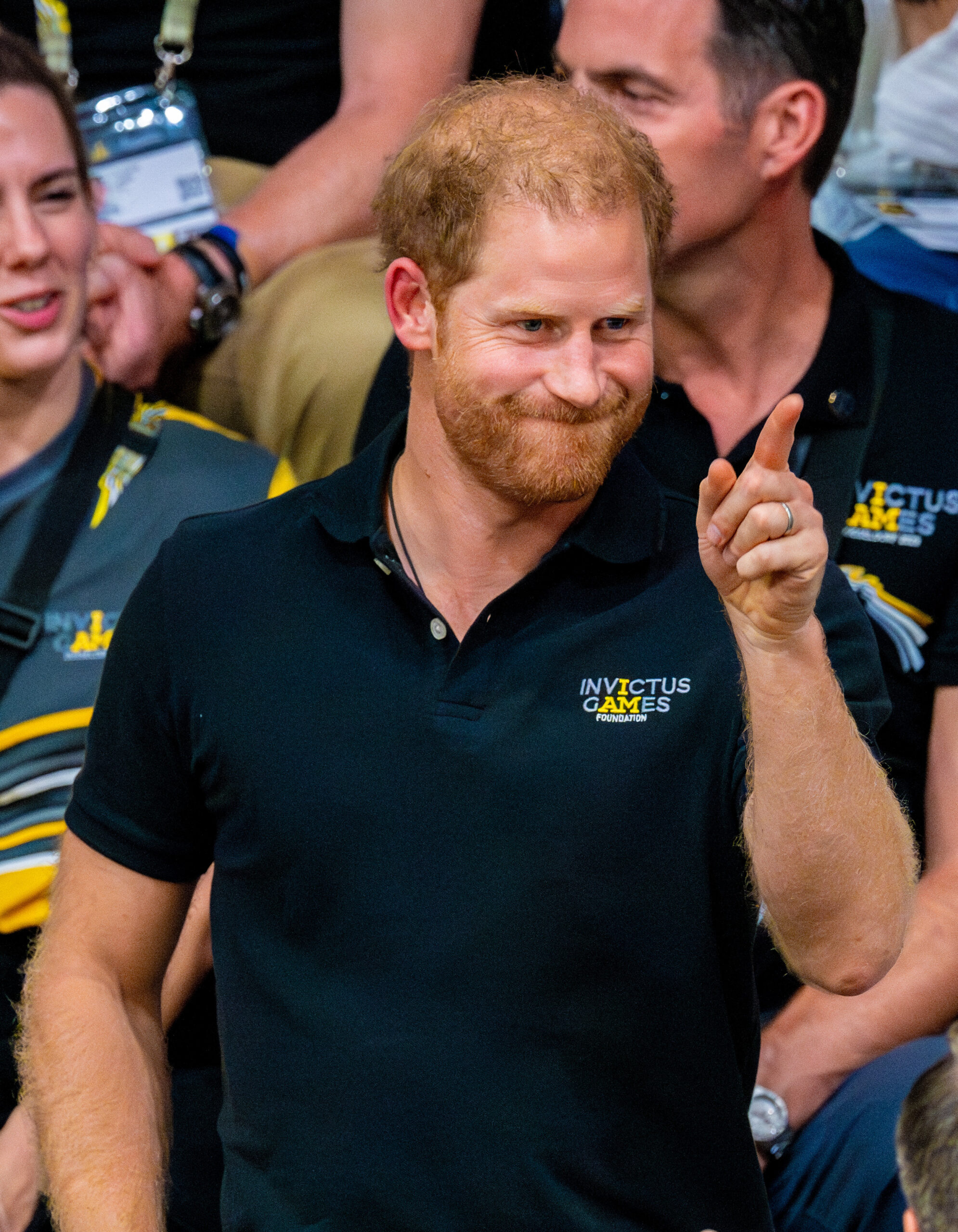 Prince Harry pointing his finger and smirking