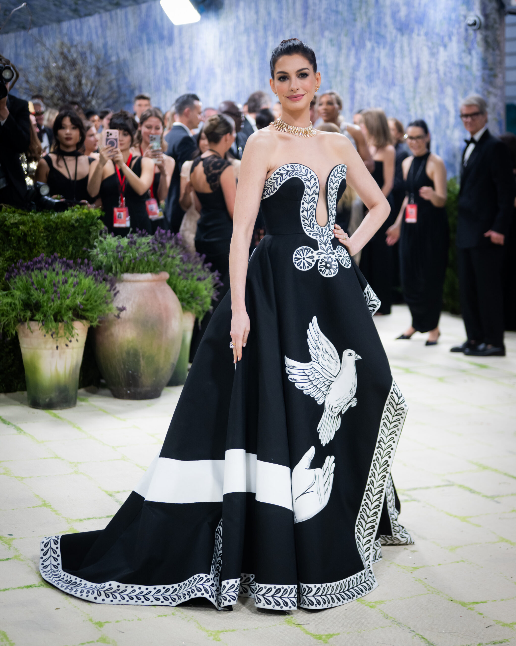 Anne Hathaway wearing a black and white gown at the Met Gala