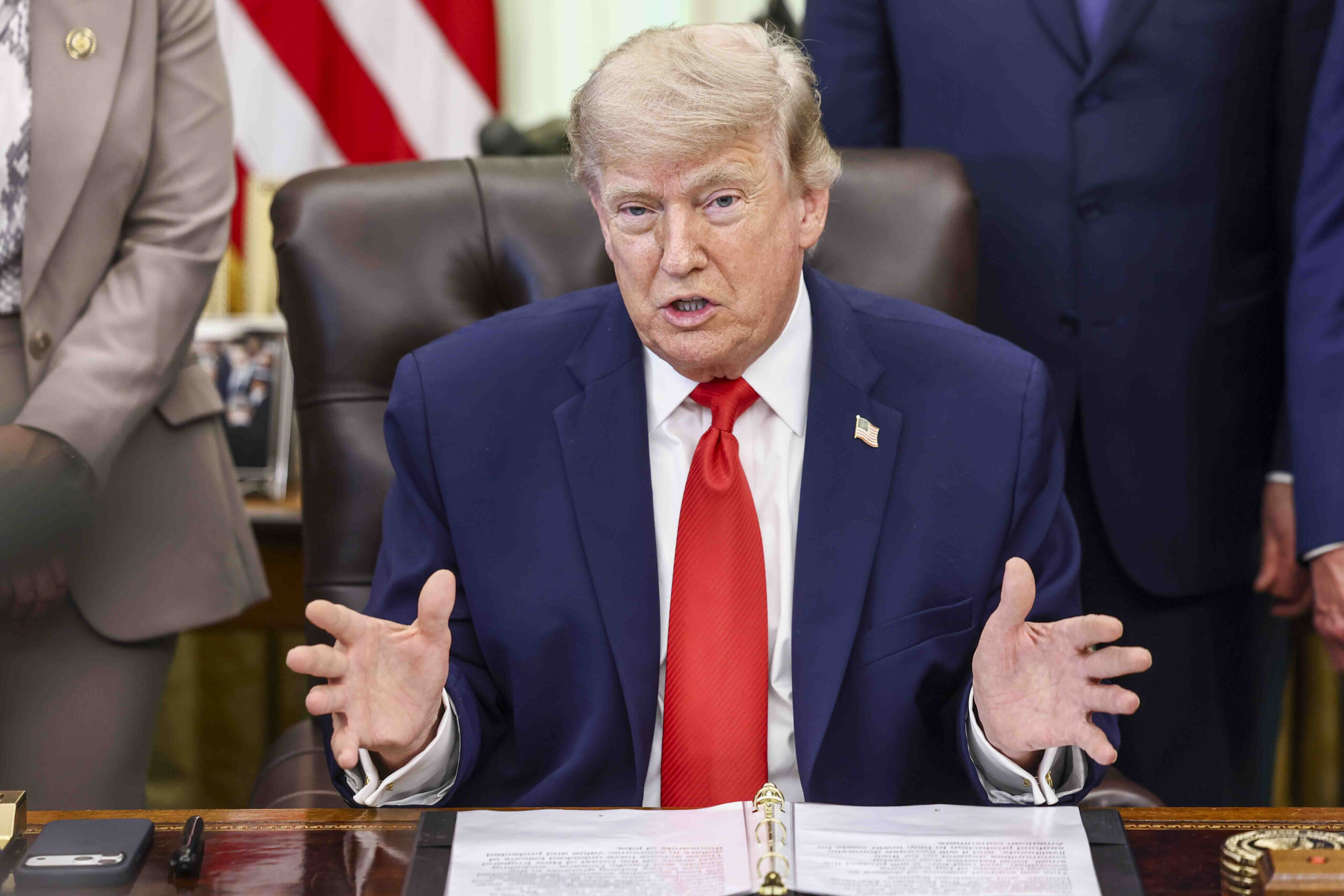 Donald Trump talking with his hands out
