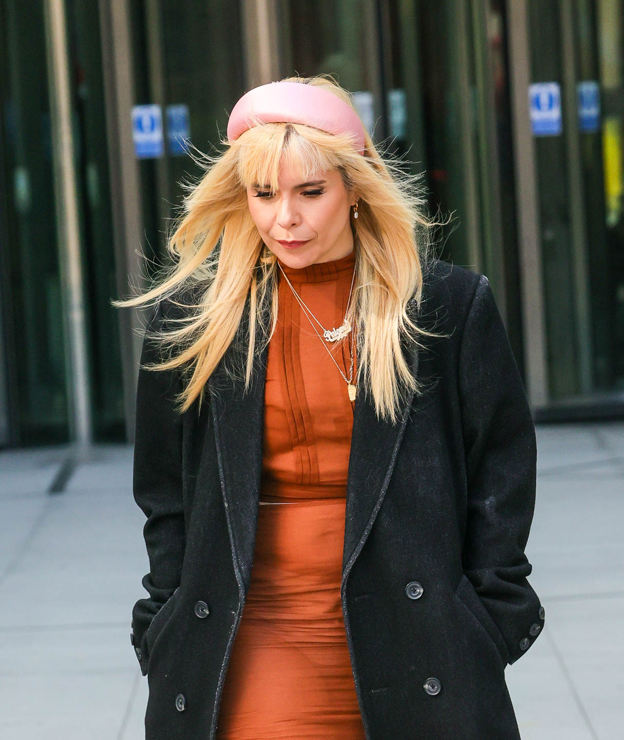 Paloma Faith walking down as she walks